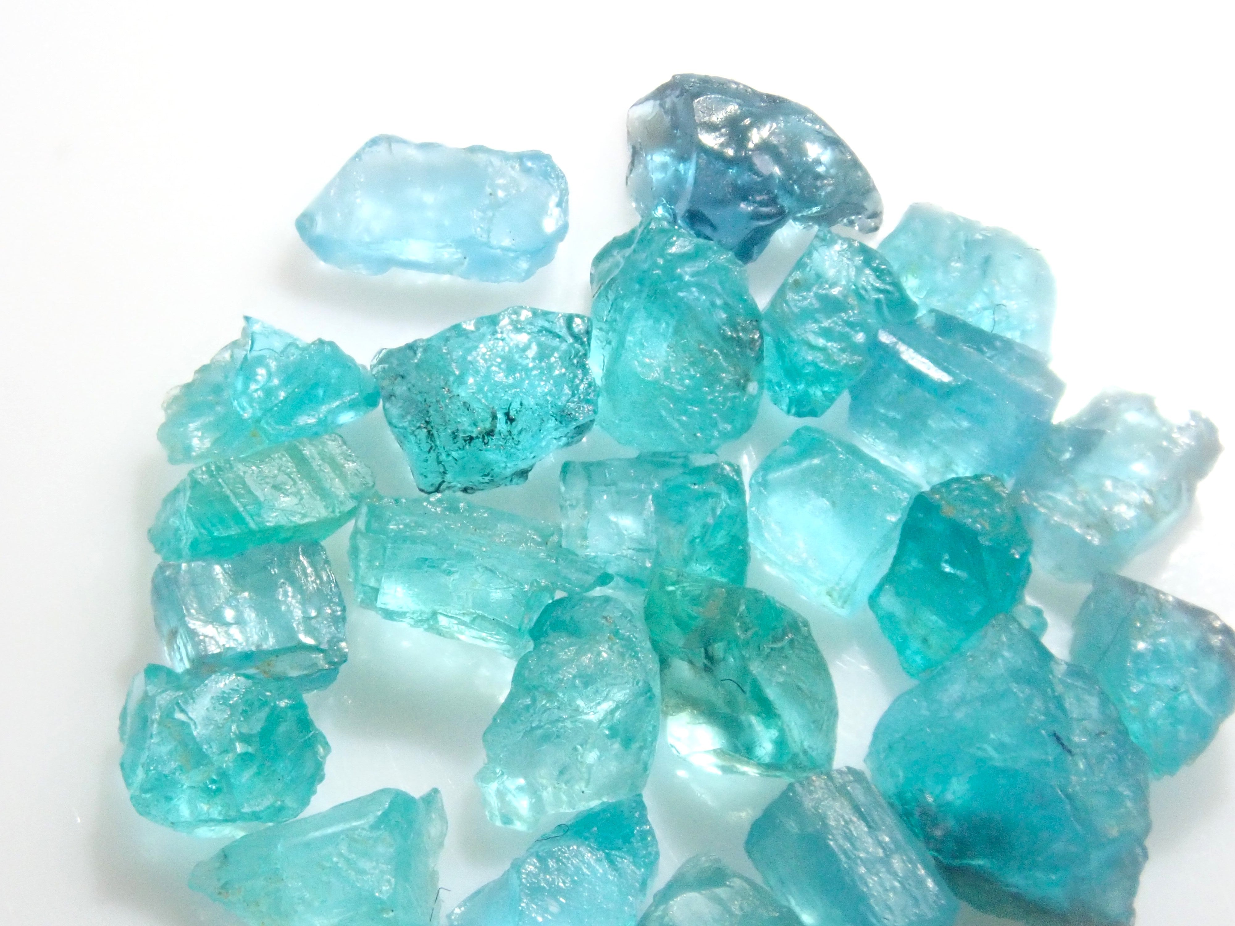 Limited to 25 stones: Brazilian Paraiba Tourmaline (including bicolor, Batalha) rough stones, average size 0.1ct. Discounts for multiple purchases available.