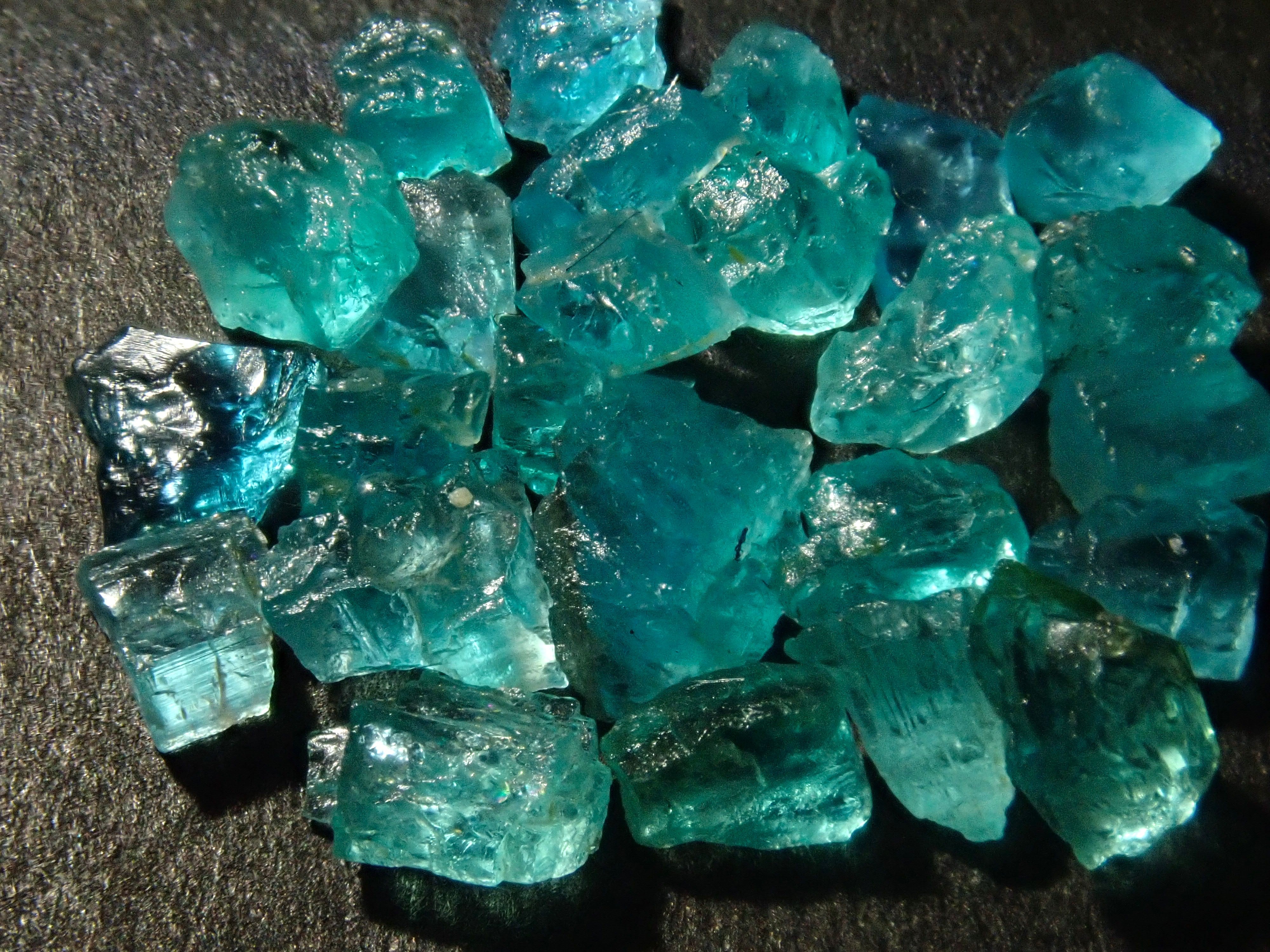 Limited to 25 stones: Brazilian Paraiba Tourmaline (including bicolor, Batalha) rough stones, average size 0.1ct. Discounts for multiple purchases available.