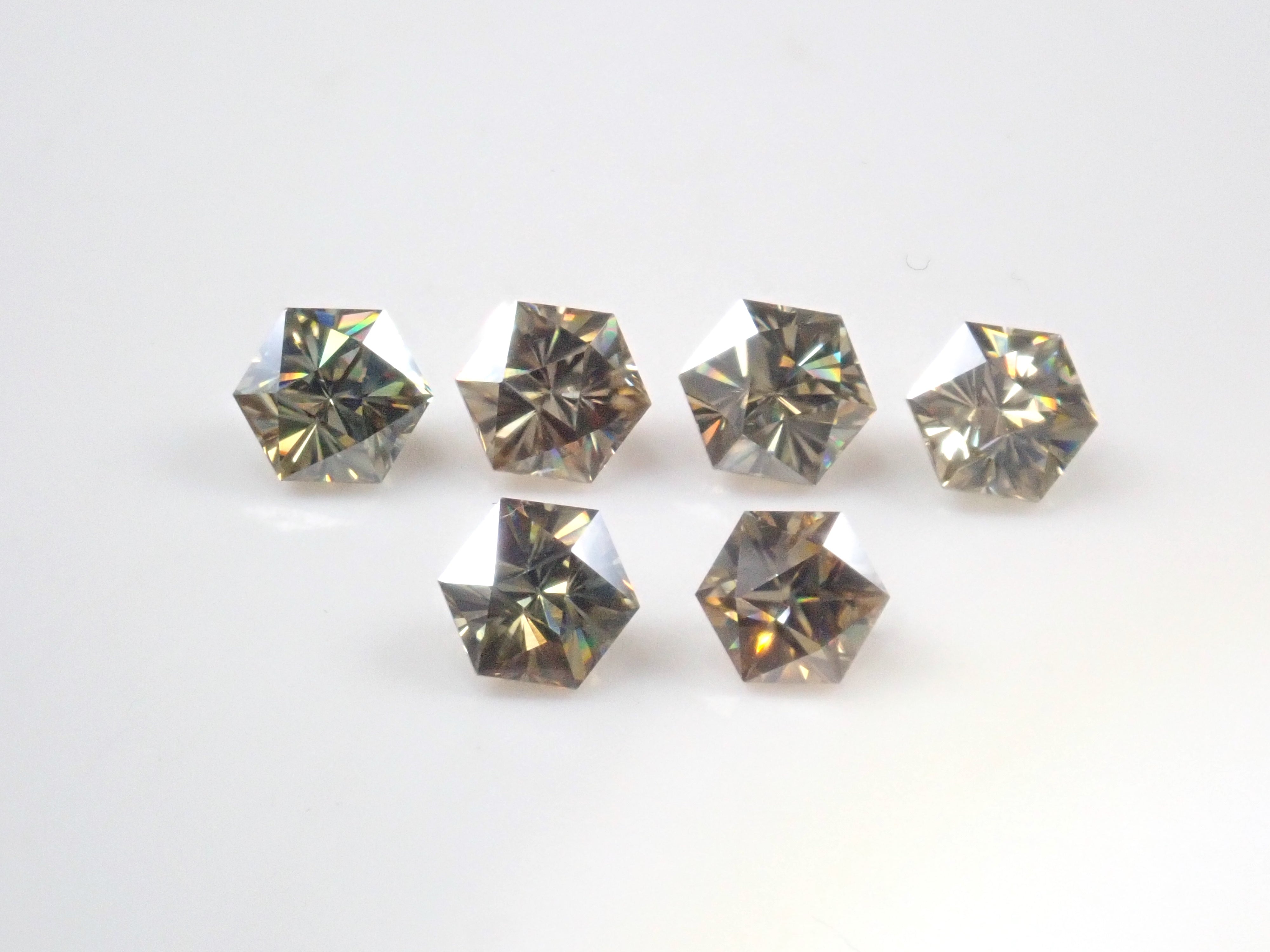 Limited to 6 stones: 1 synthetic moissanite loose stone (hexagonal cut, 5mm) Multiple purchase discounts available