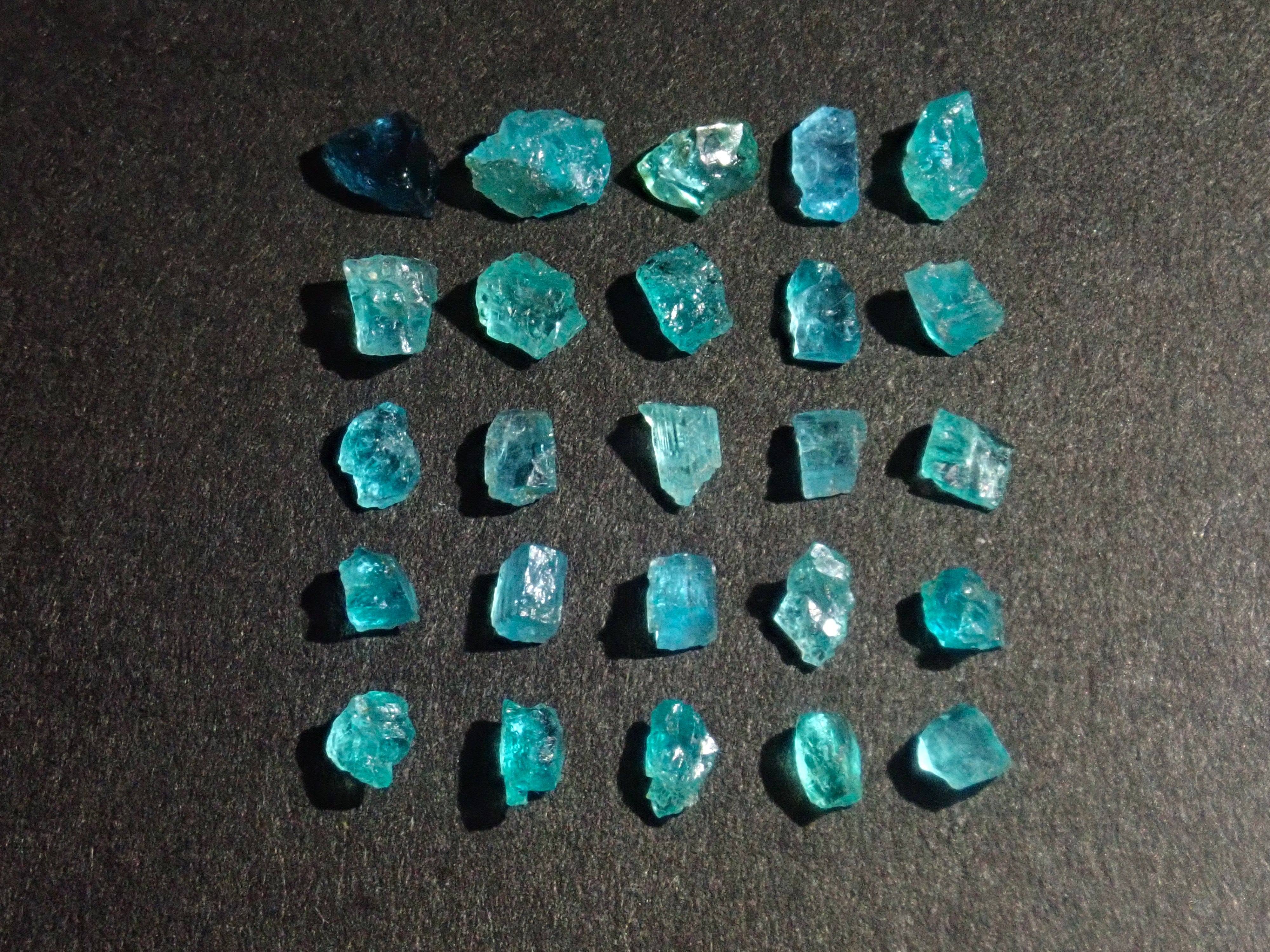 Limited to 25 stones: Brazilian Paraiba Tourmaline (including bicolor, Batalha) rough stones, average size 0.1ct. Discounts for multiple purchases available.