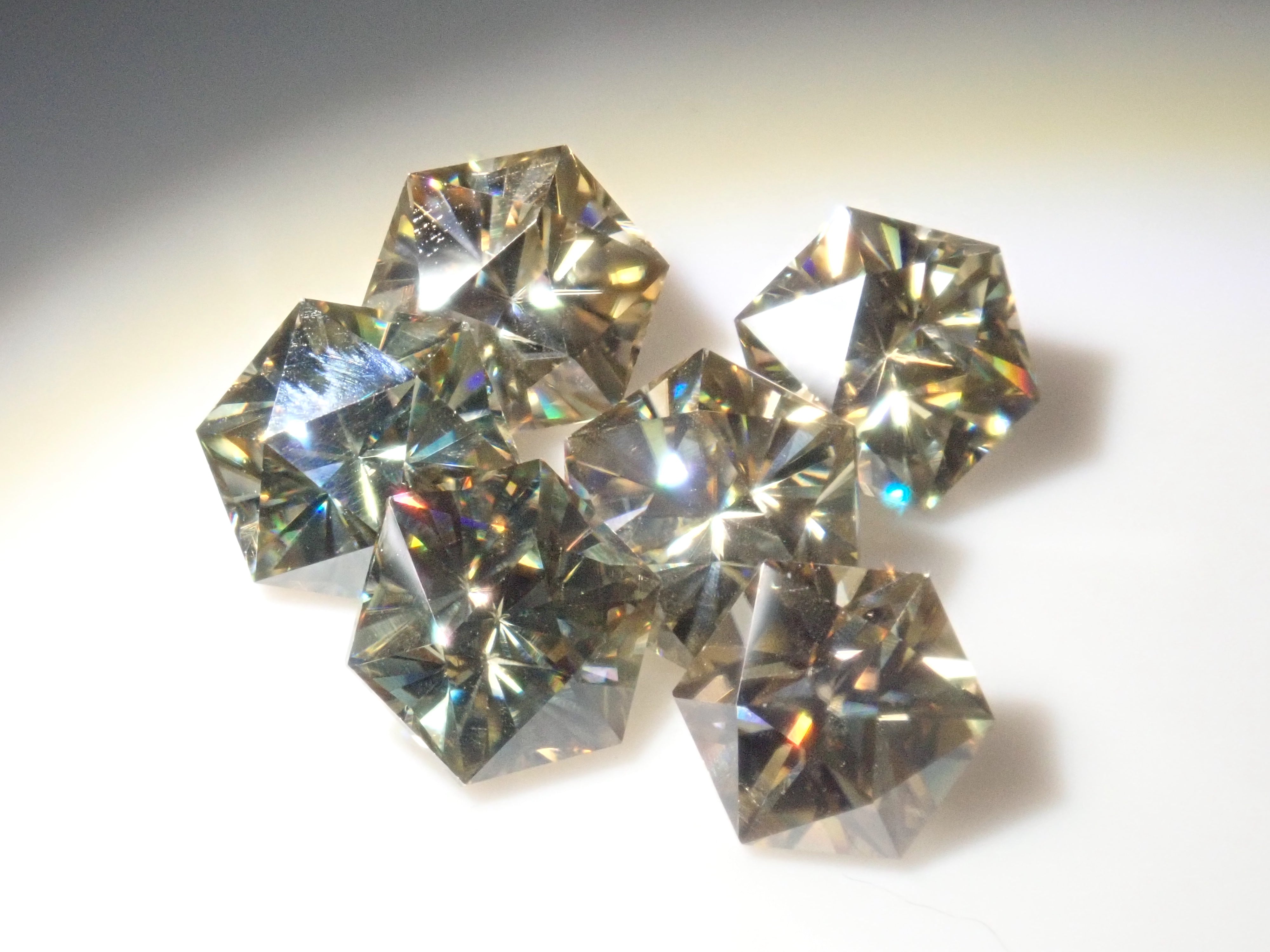 Limited to 6 stones: 1 synthetic moissanite loose stone (hexagonal cut, 5mm) Multiple purchase discounts available