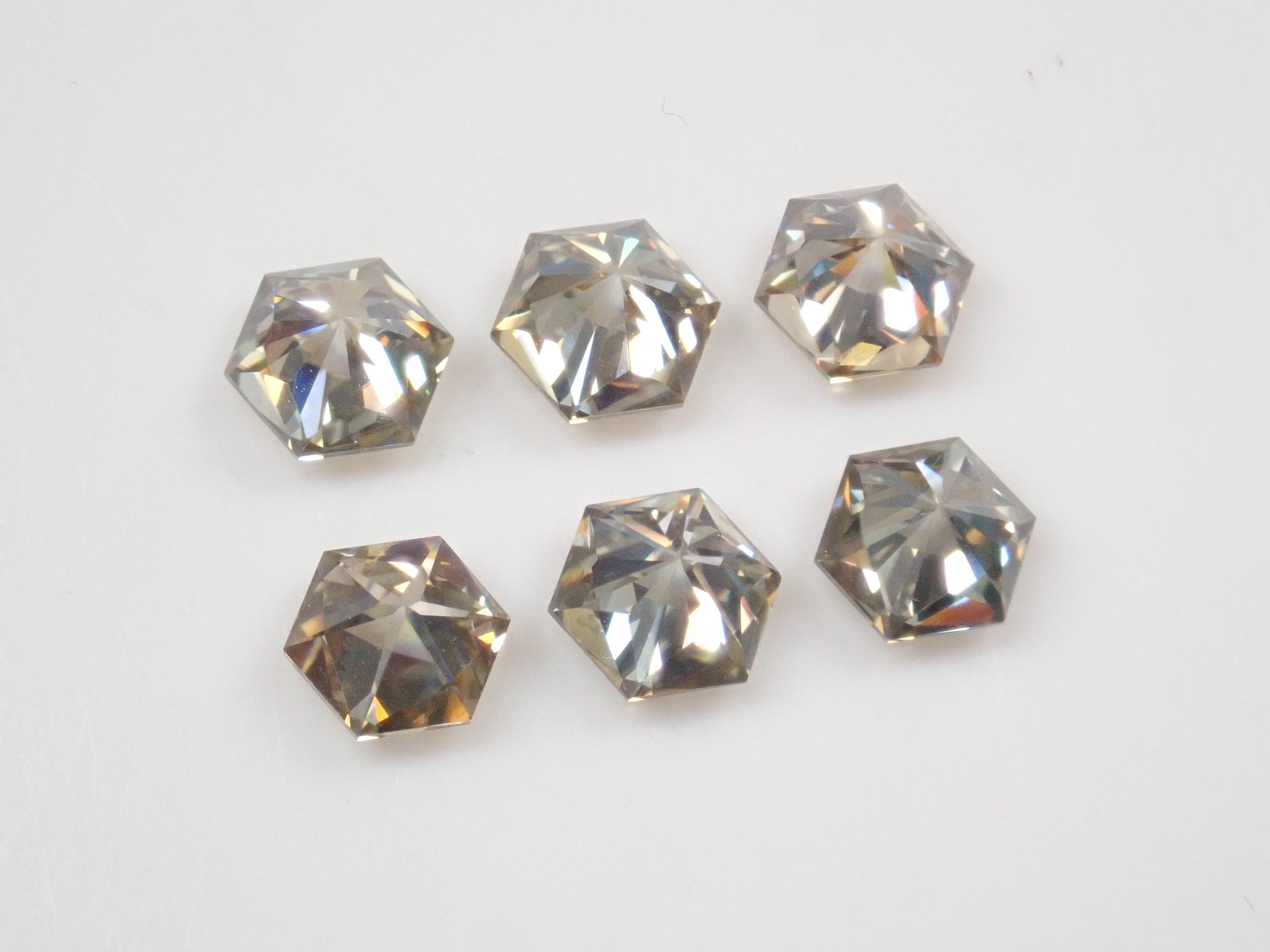 Limited to 6 stones: 1 synthetic moissanite loose stone (hexagonal cut, 5mm) Multiple purchase discounts available