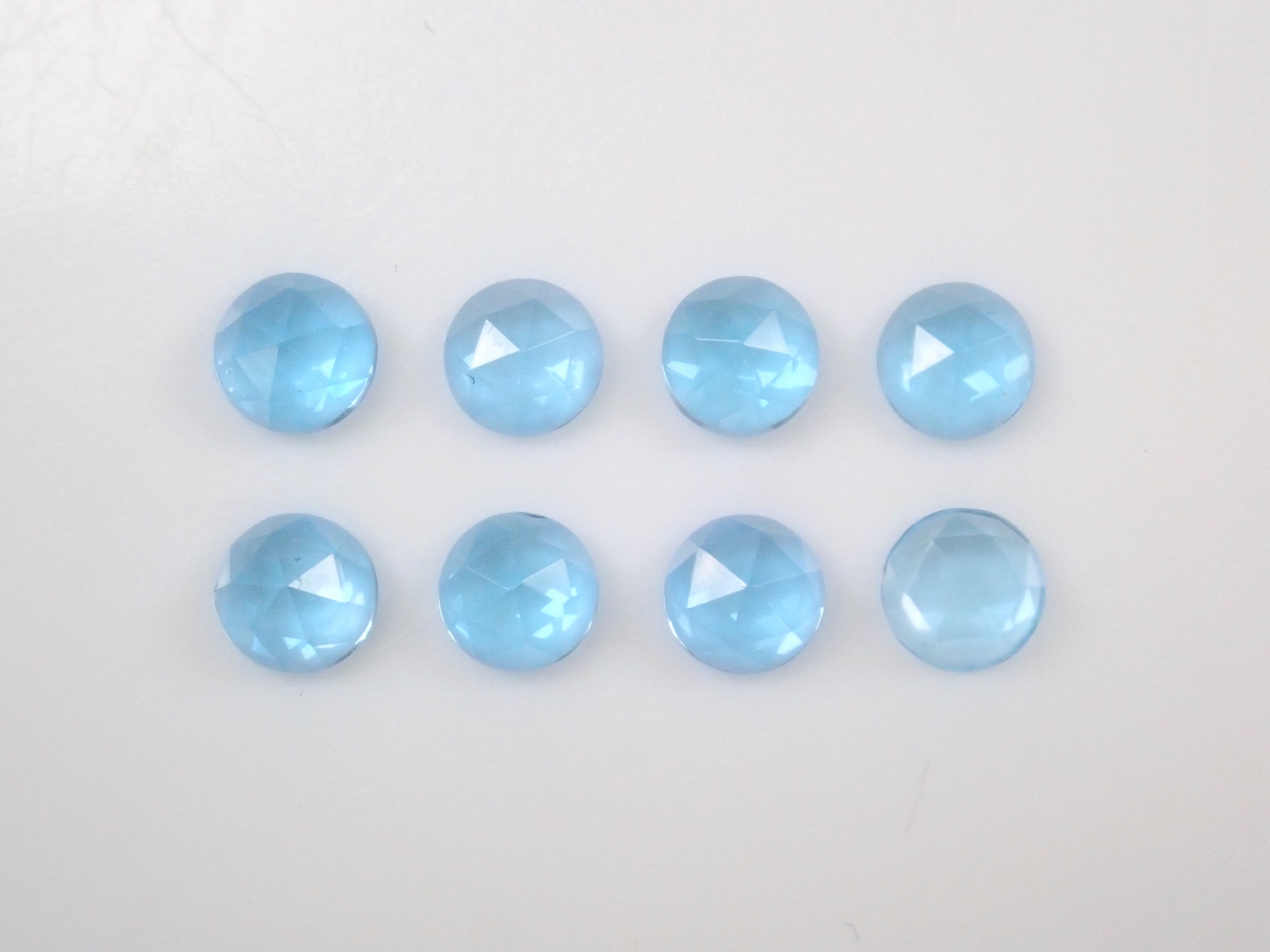 Limited to 8 stones: Swiss blue topaz (4mm, rose cut) 1 loose stone. Discounts available for multiple purchases.