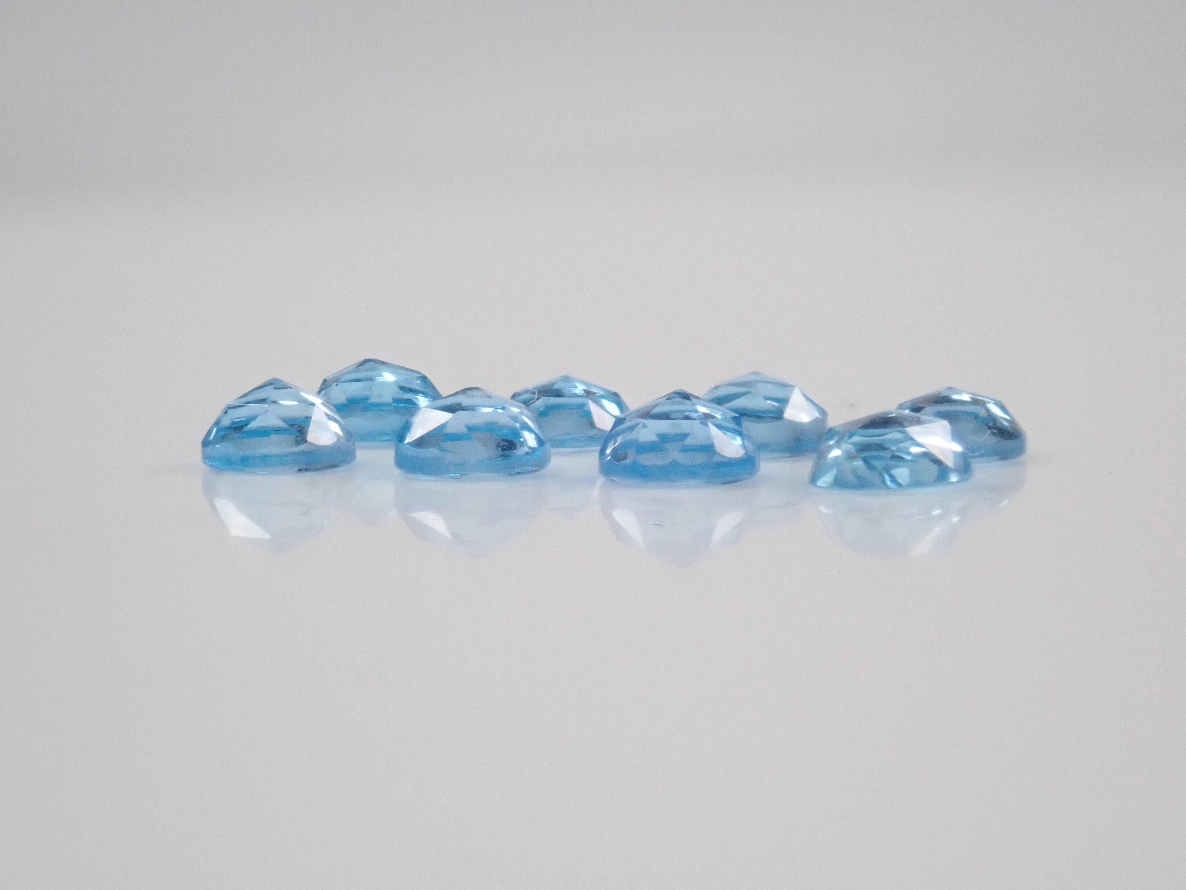 Limited to 8 stones: Swiss blue topaz (4mm, rose cut) 1 loose stone. Discounts available for multiple purchases.