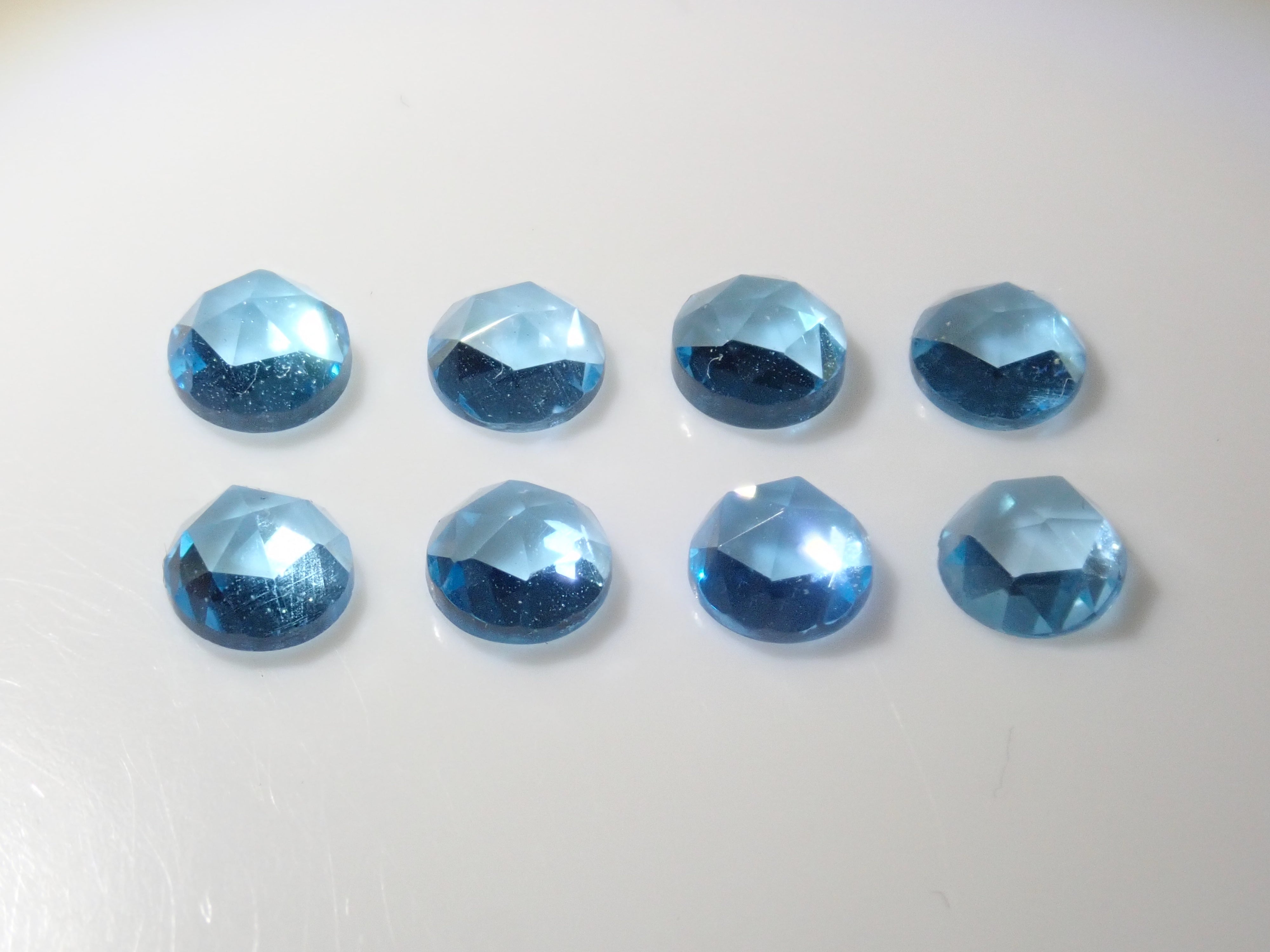 Limited to 8 stones: Swiss blue topaz (4mm, rose cut) 1 loose stone. Discounts available for multiple purchases.