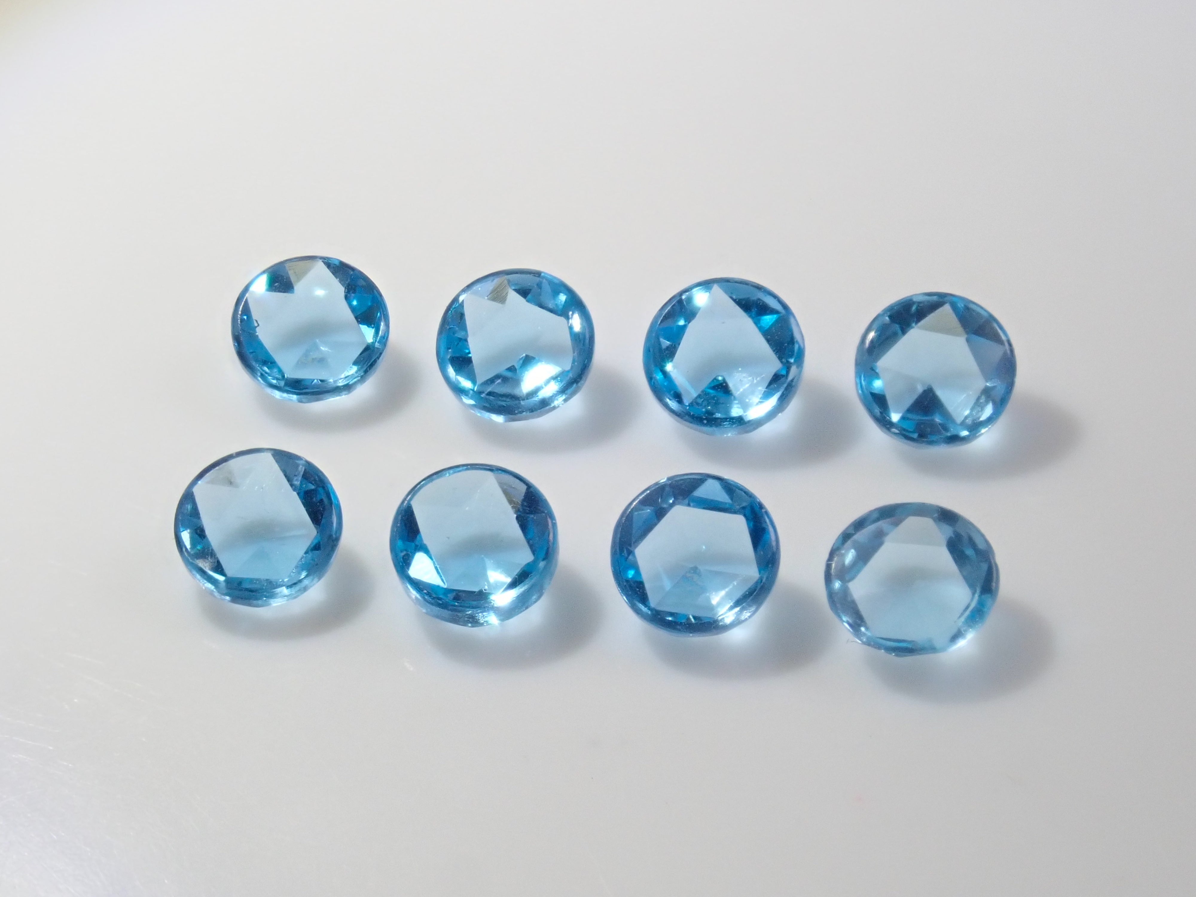 Limited to 8 stones: Swiss blue topaz (4mm, rose cut) 1 loose stone. Discounts available for multiple purchases.