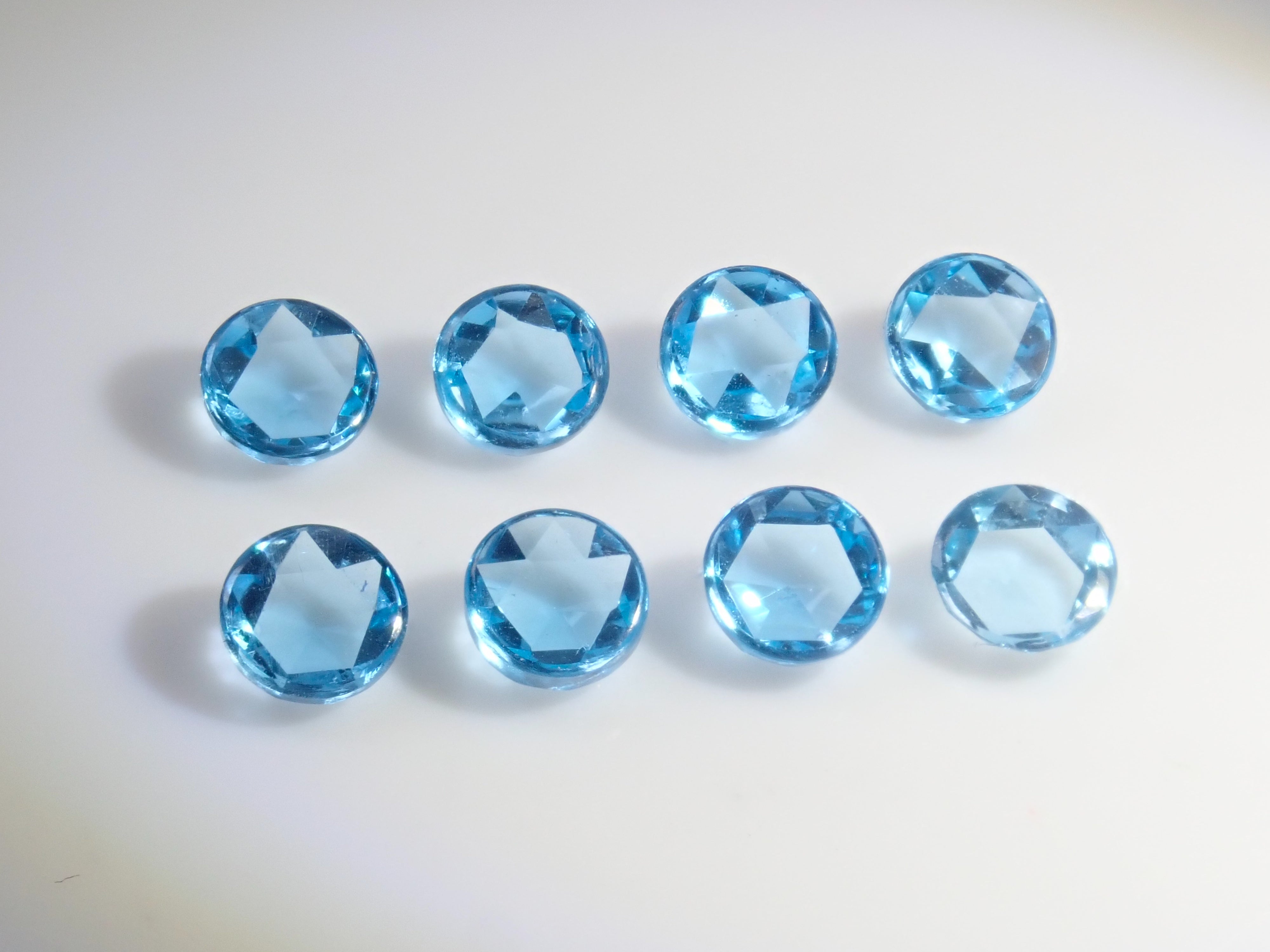 Limited to 8 stones: Swiss blue topaz (4mm, rose cut) 1 loose stone. Discounts available for multiple purchases.