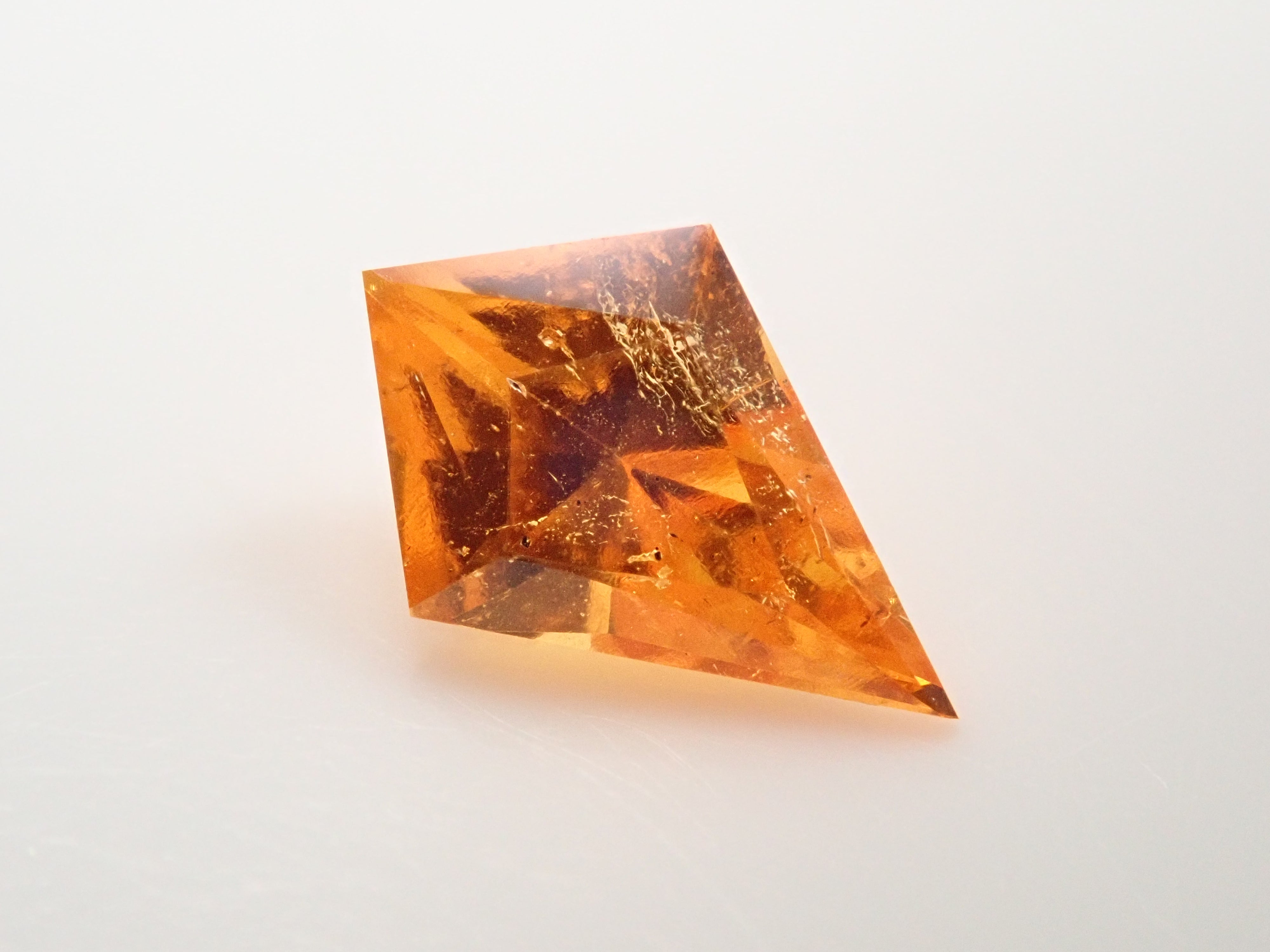 12560785掲載】タンザニア産マンダリンガーネット 0.315ctルース