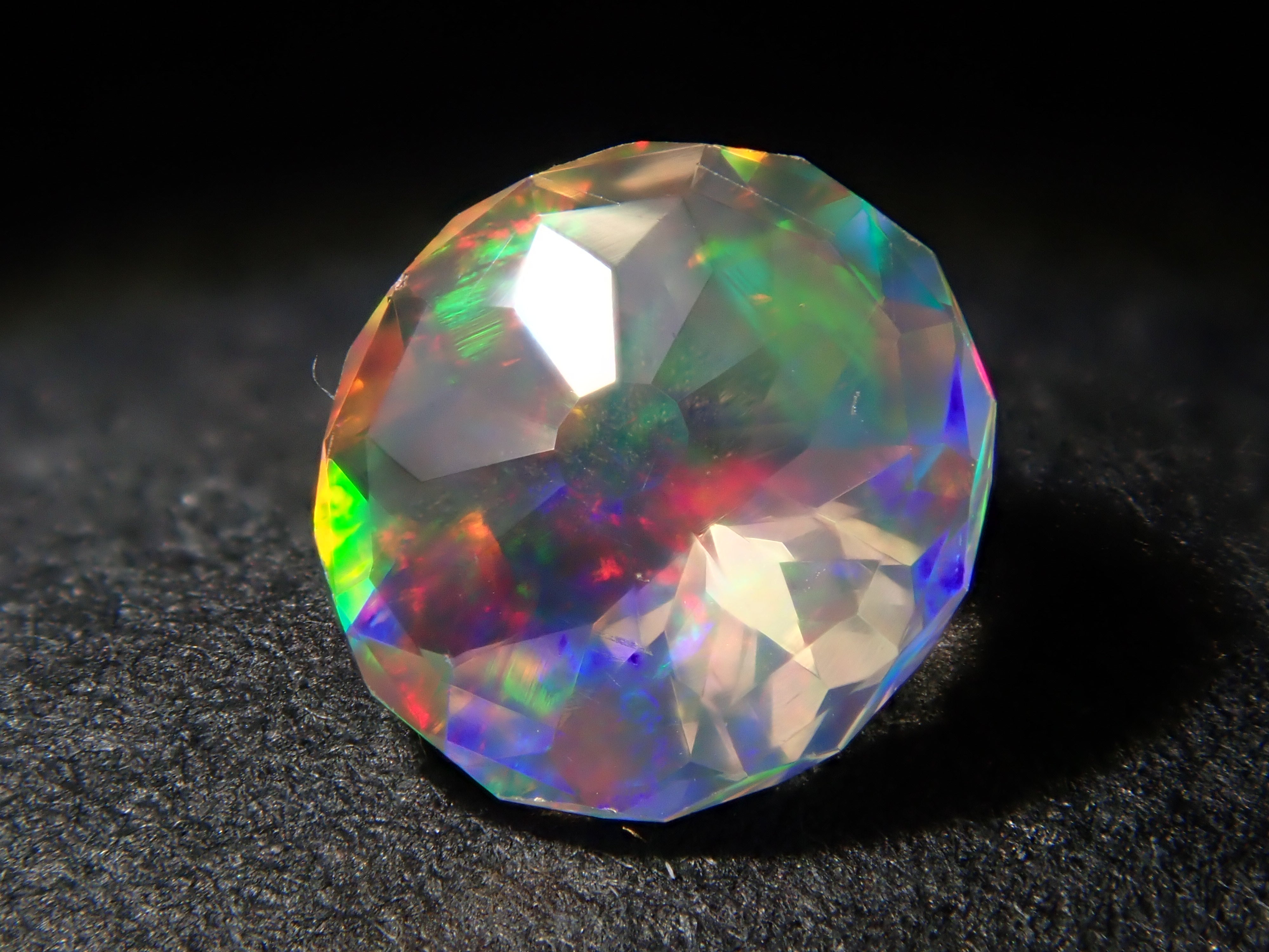 [12557610] Mexican Fire Opal (Faceted) 0.218ct Loose