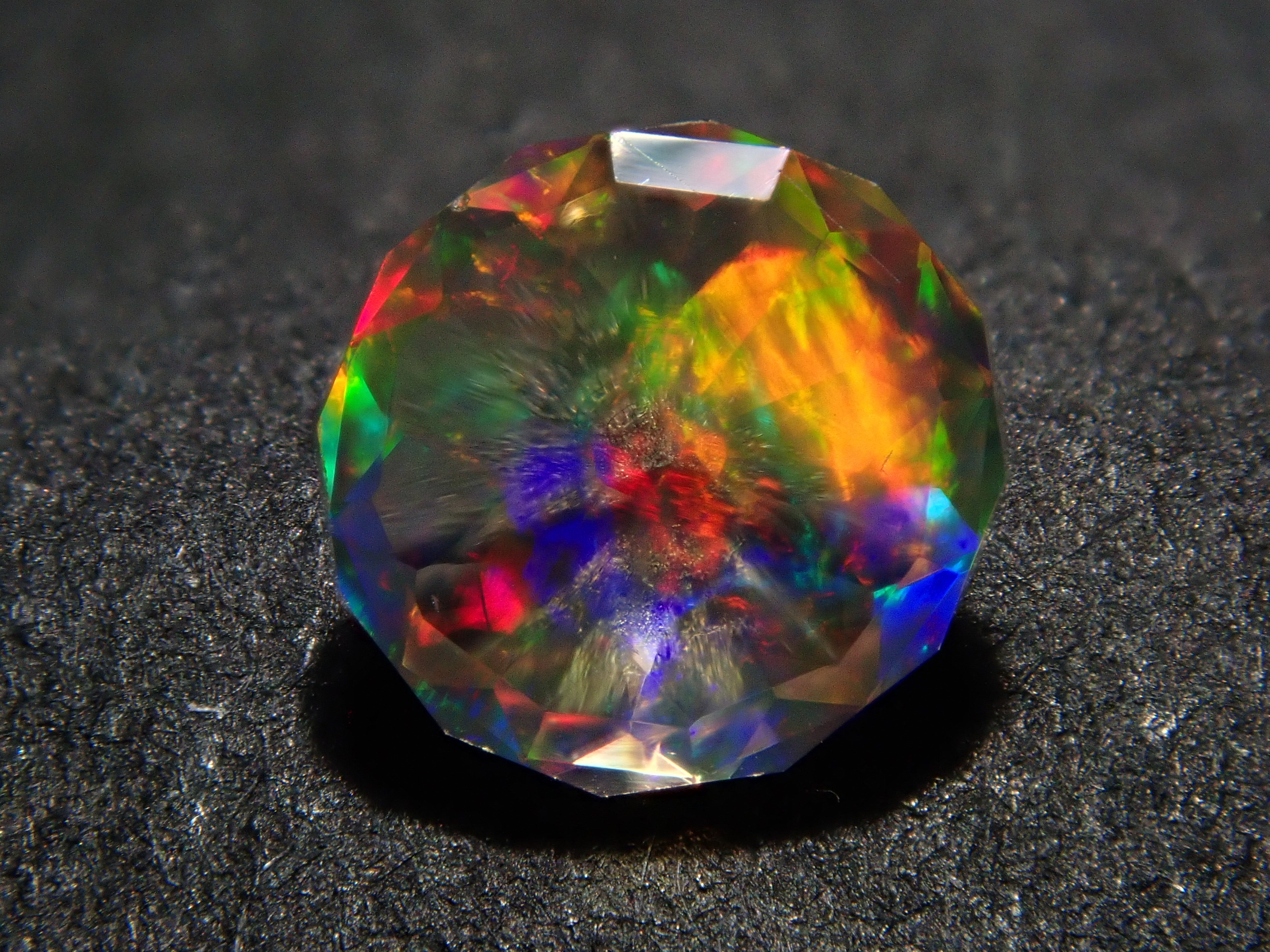 [12557610] Mexican Fire Opal (Faceted) 0.218ct Loose
