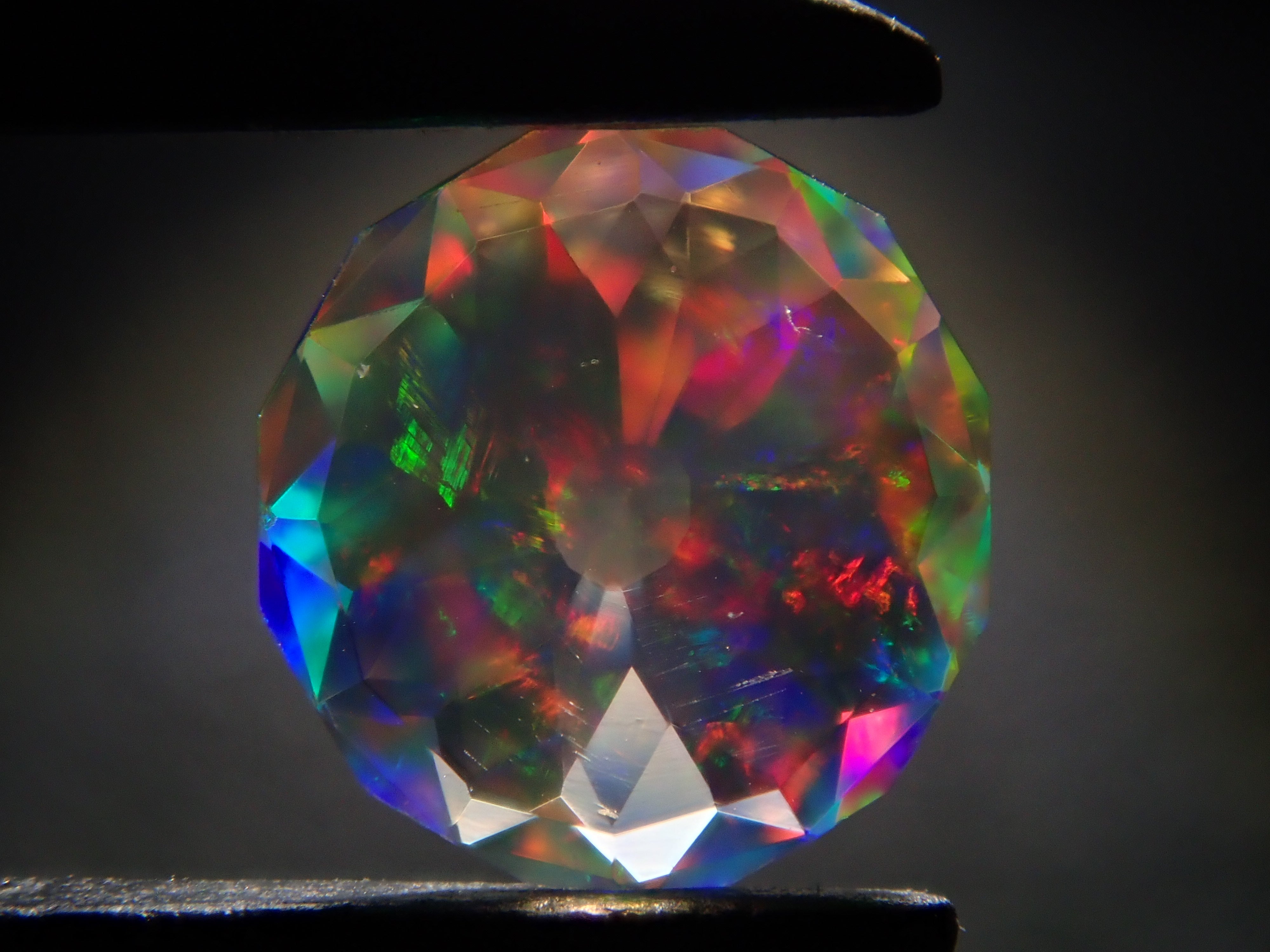 [12557610] Mexican Fire Opal (Faceted) 0.218ct Loose