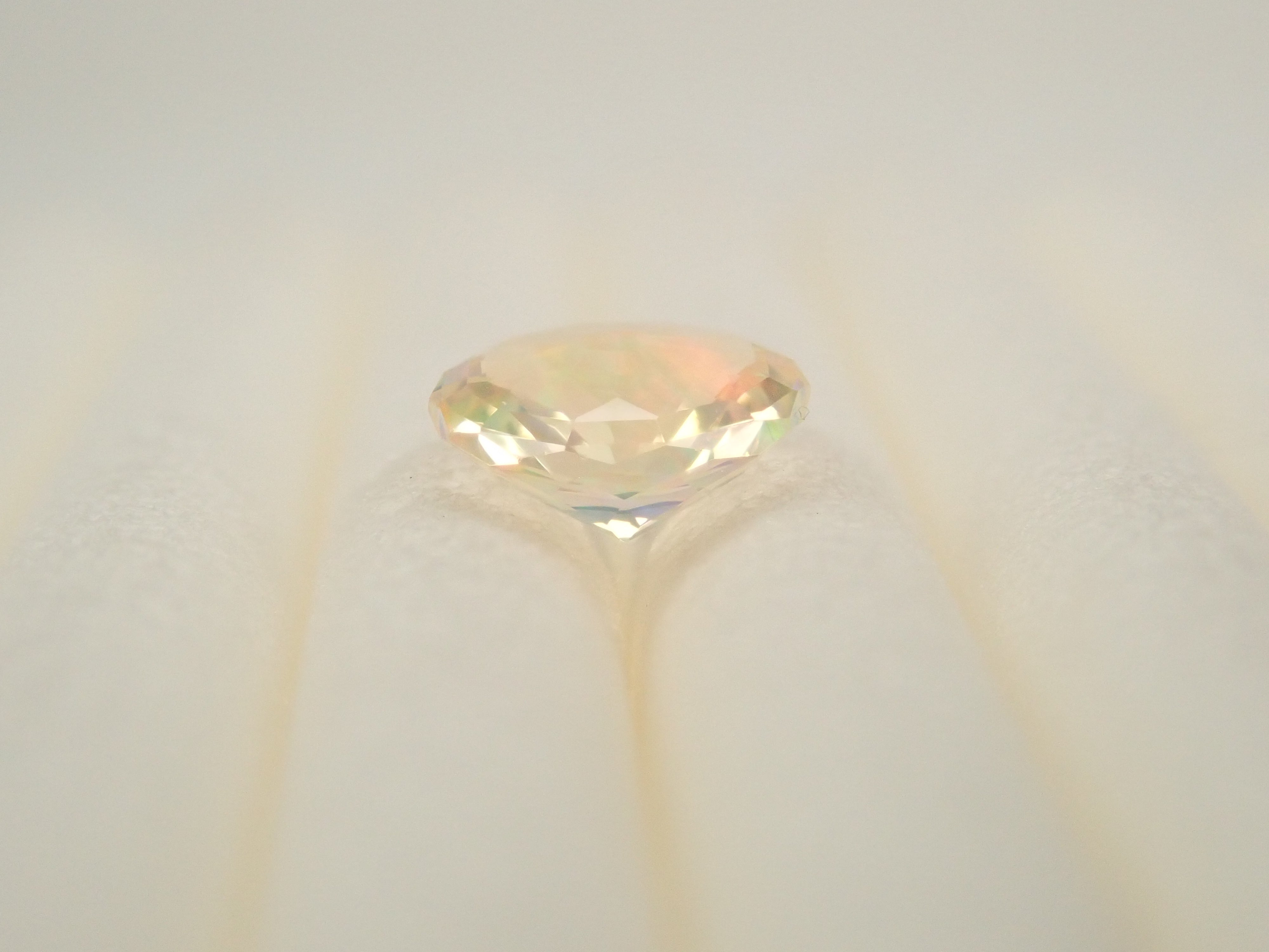 [12557610] Mexican Fire Opal (Faceted) 0.218ct Loose