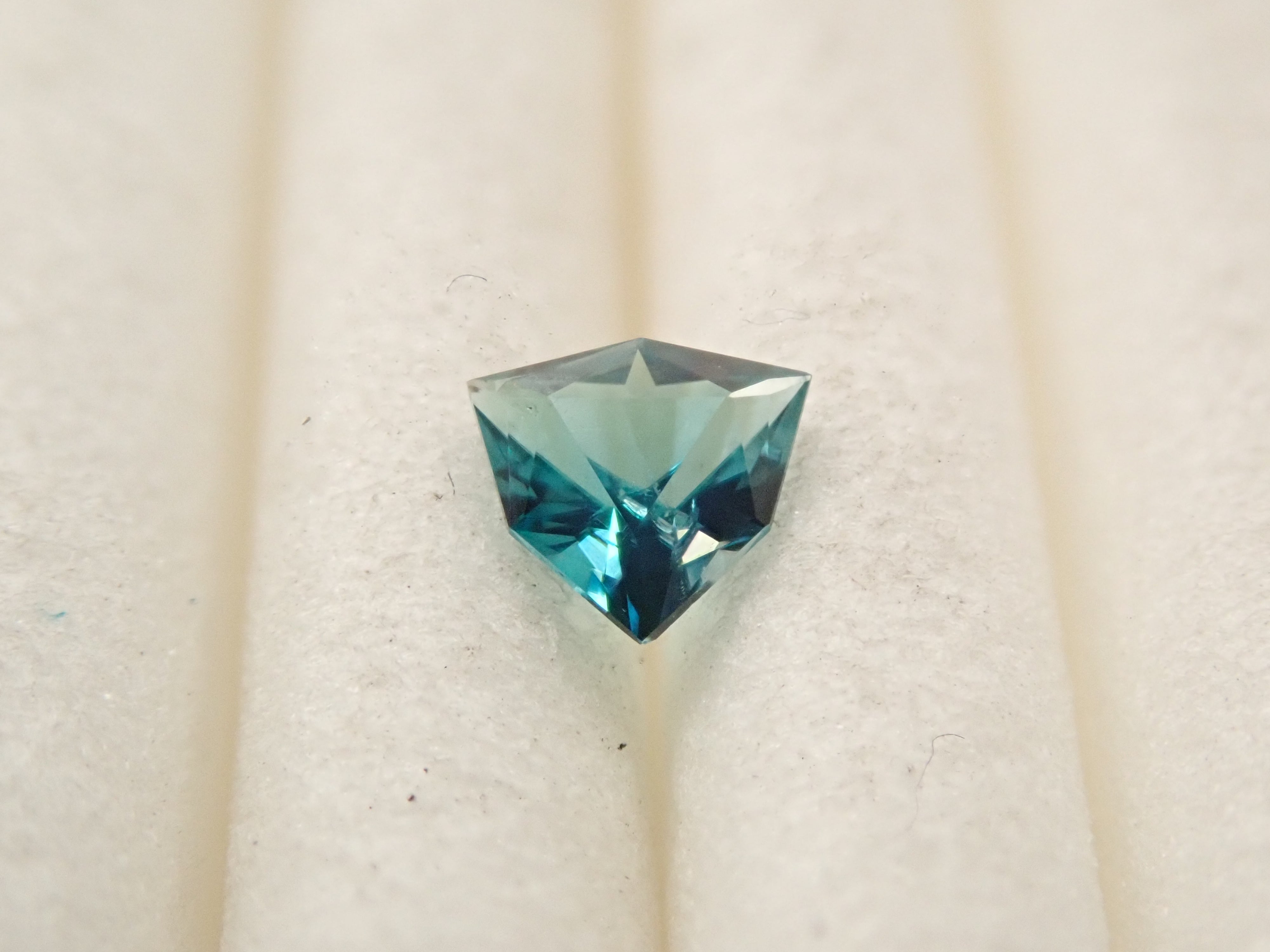 [12561267] Grandidierite from Madagascar 0.097ct loose stone