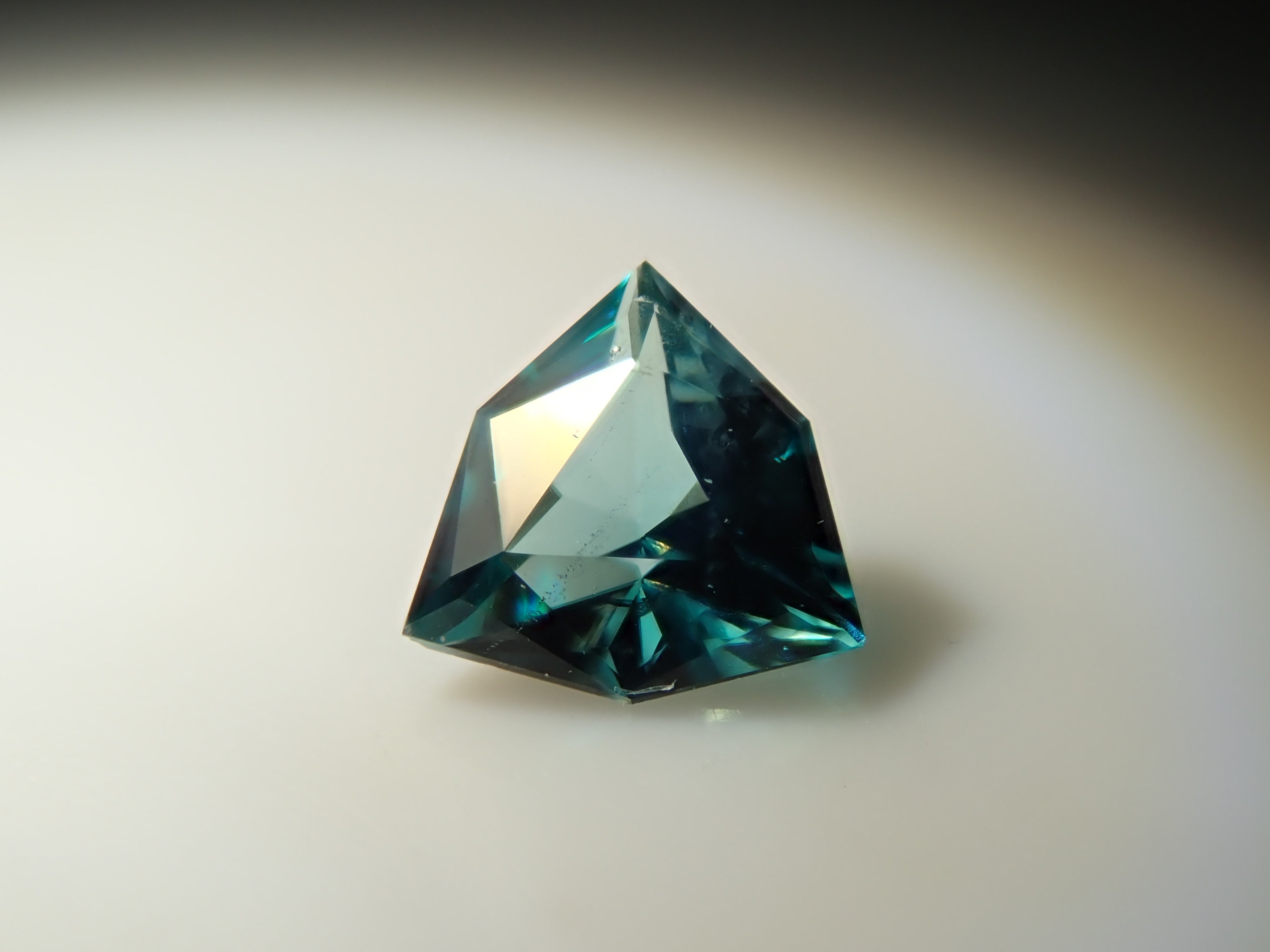 [12561267] Grandidierite from Madagascar 0.097ct loose stone