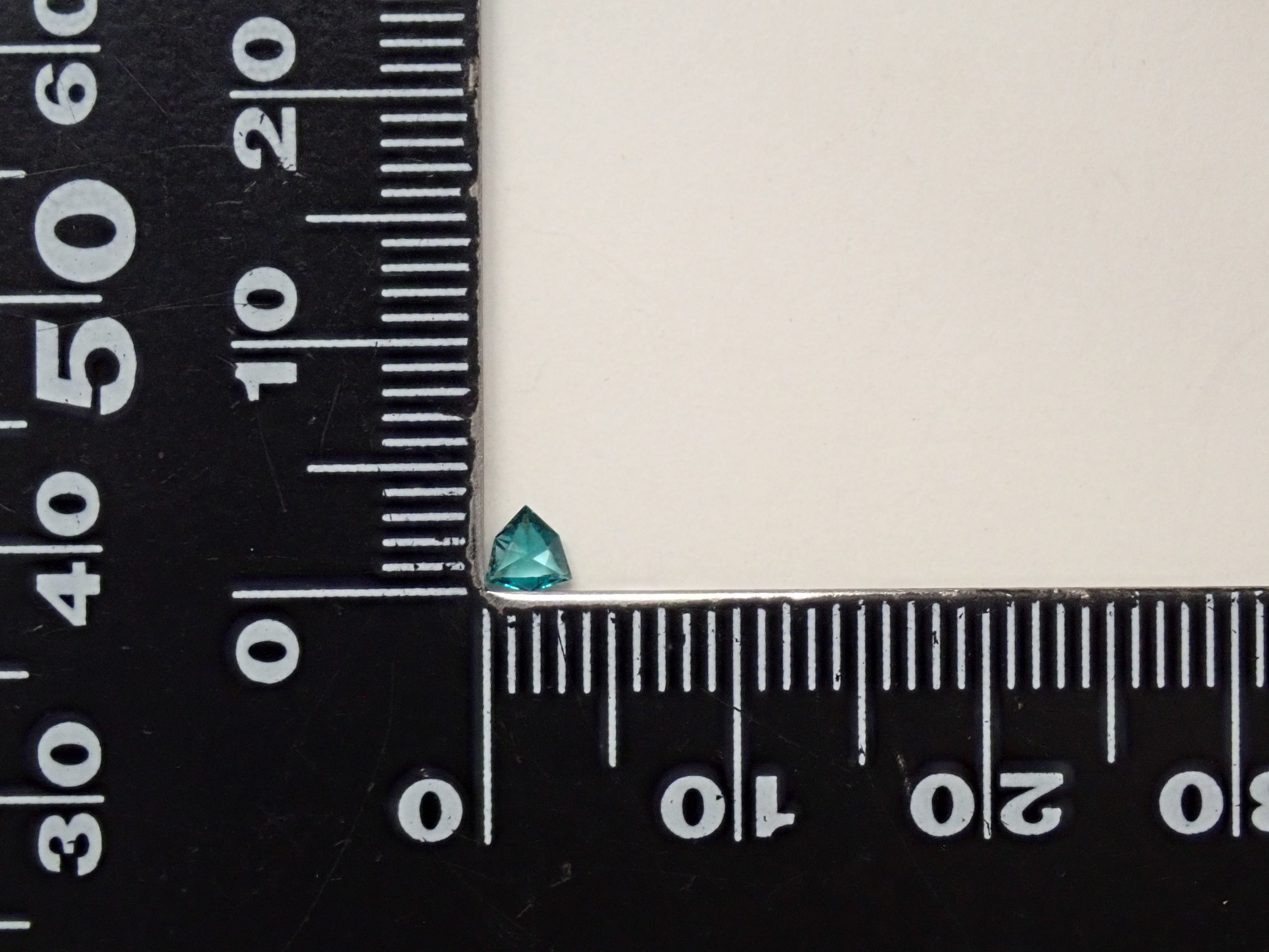 [12561267] Grandidierite from Madagascar 0.097ct loose stone