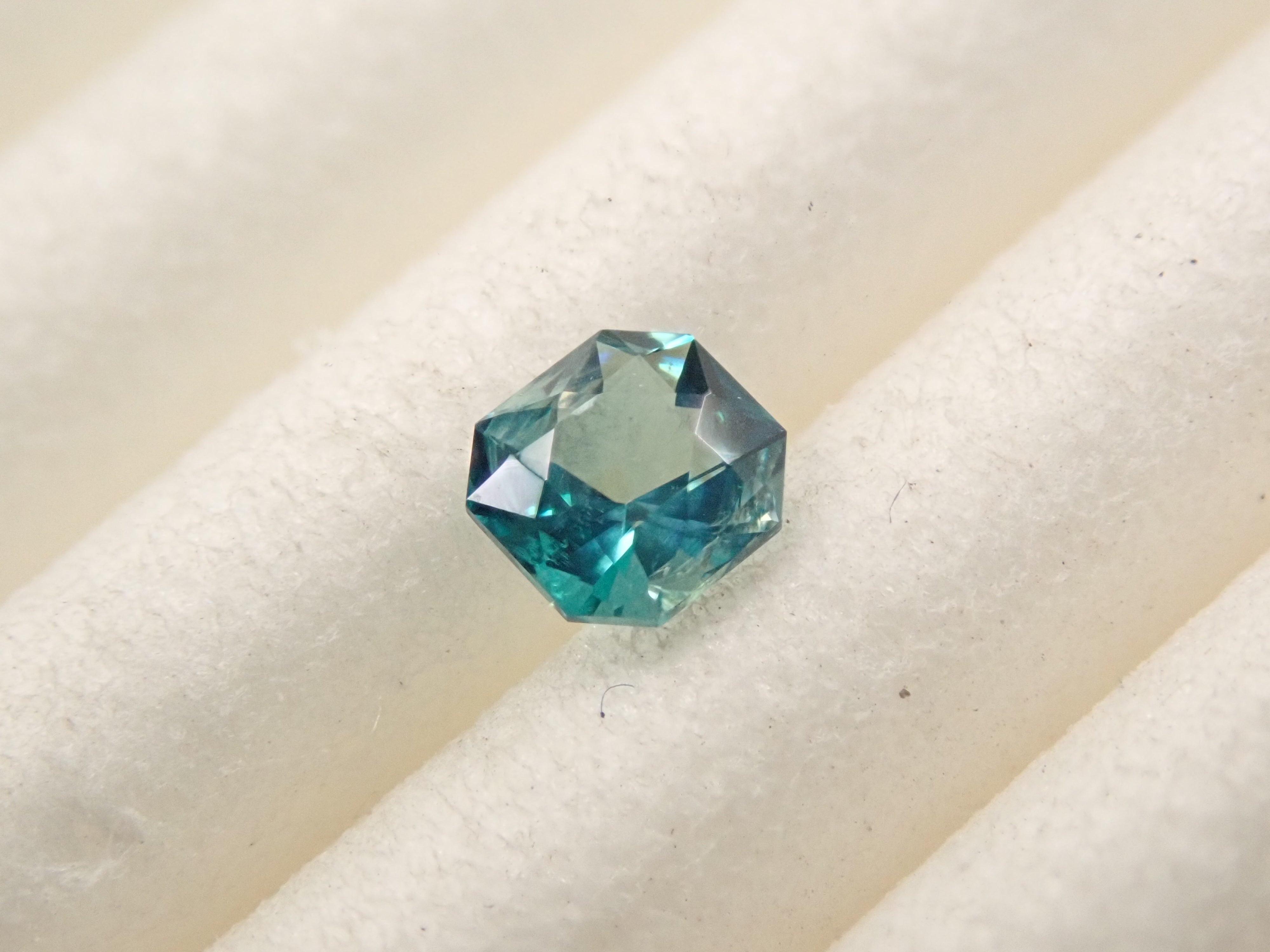 [12561268] Grandidierite from Madagascar 0.099ct loose stone
