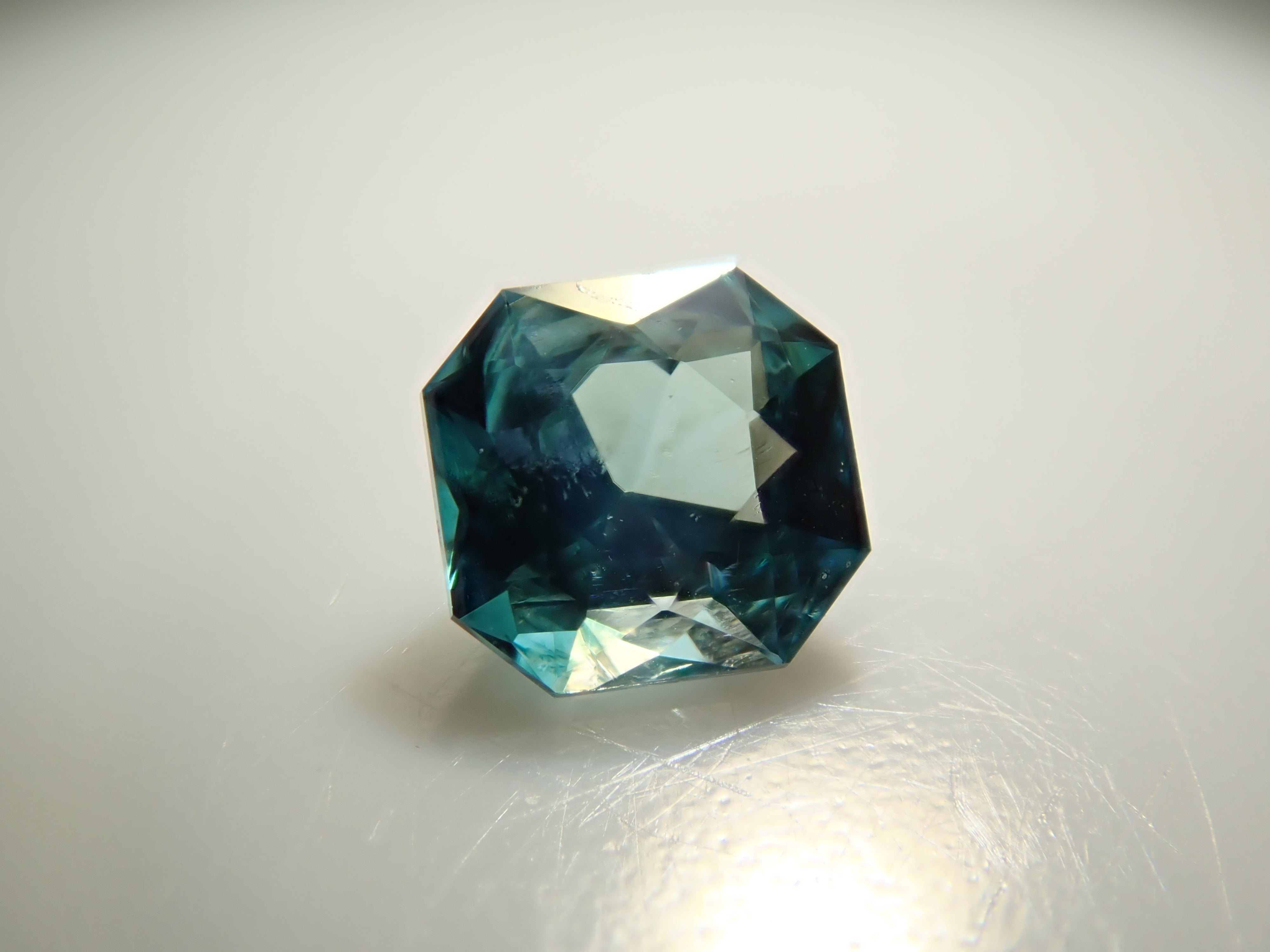 [12561268] Grandidierite from Madagascar 0.099ct loose stone