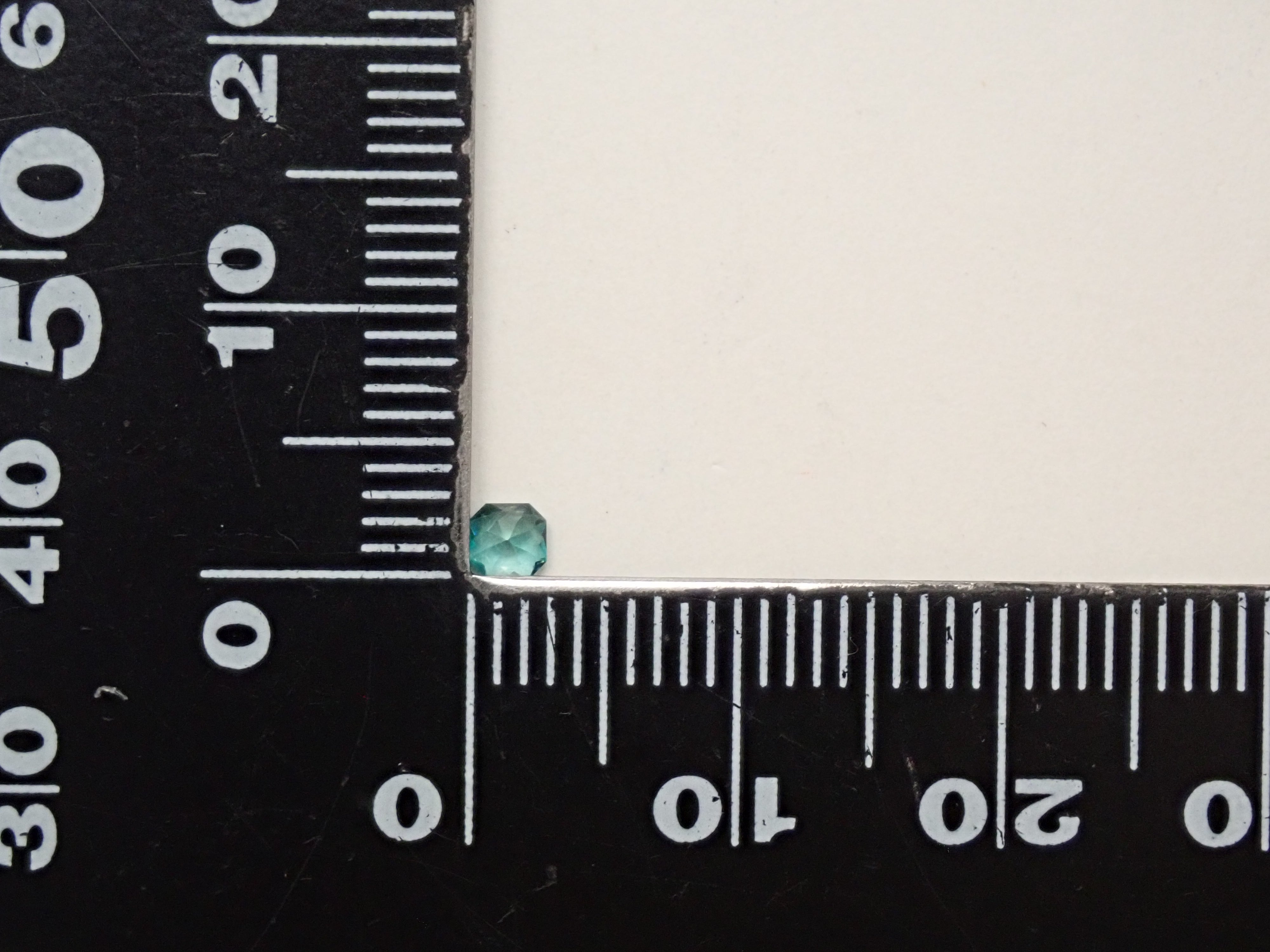 [12561268] Grandidierite from Madagascar 0.099ct loose stone