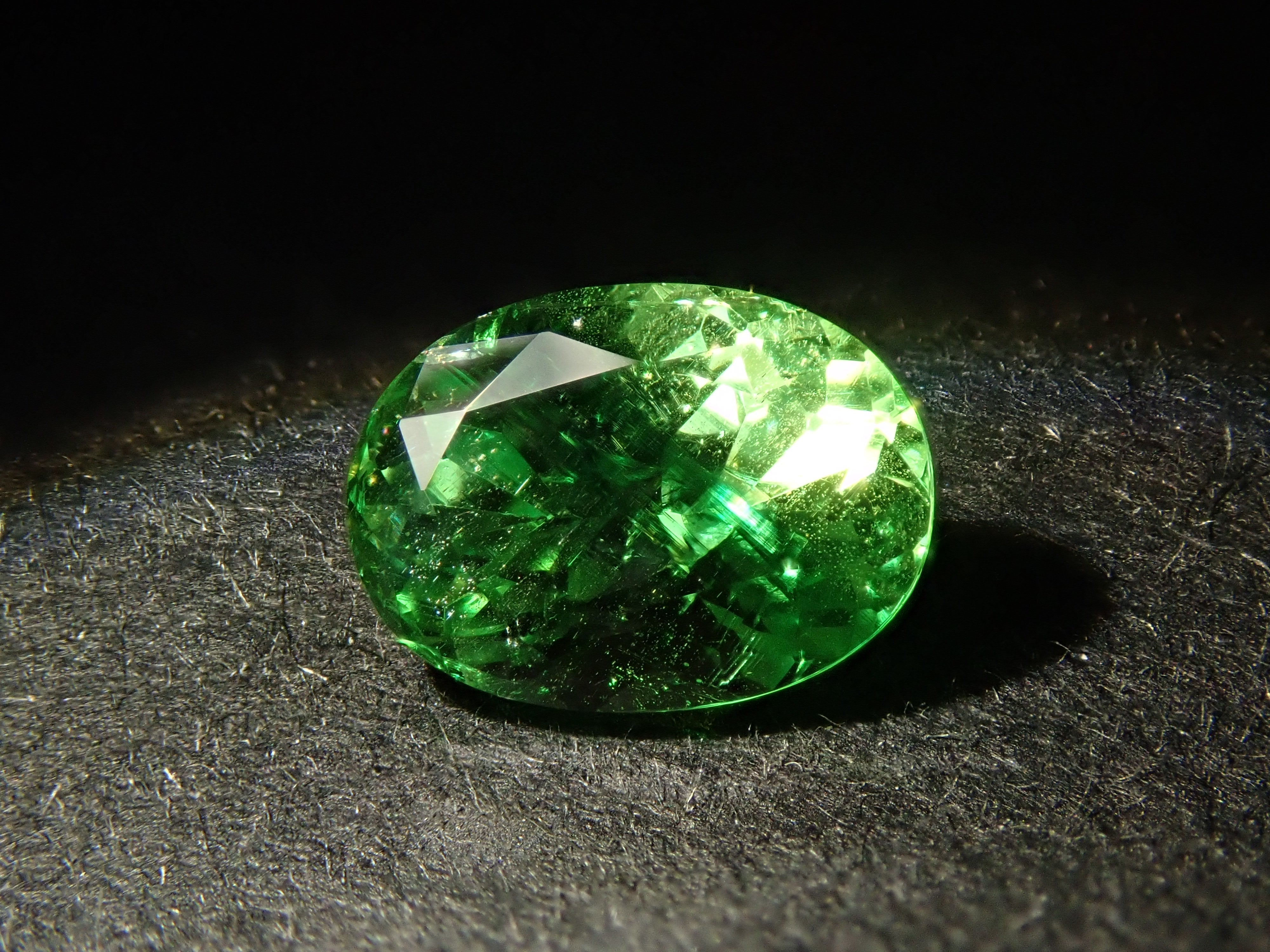 【12561607掲載】タンザニア産バイカラーグロッシュラーガーネット 0.796ctルース