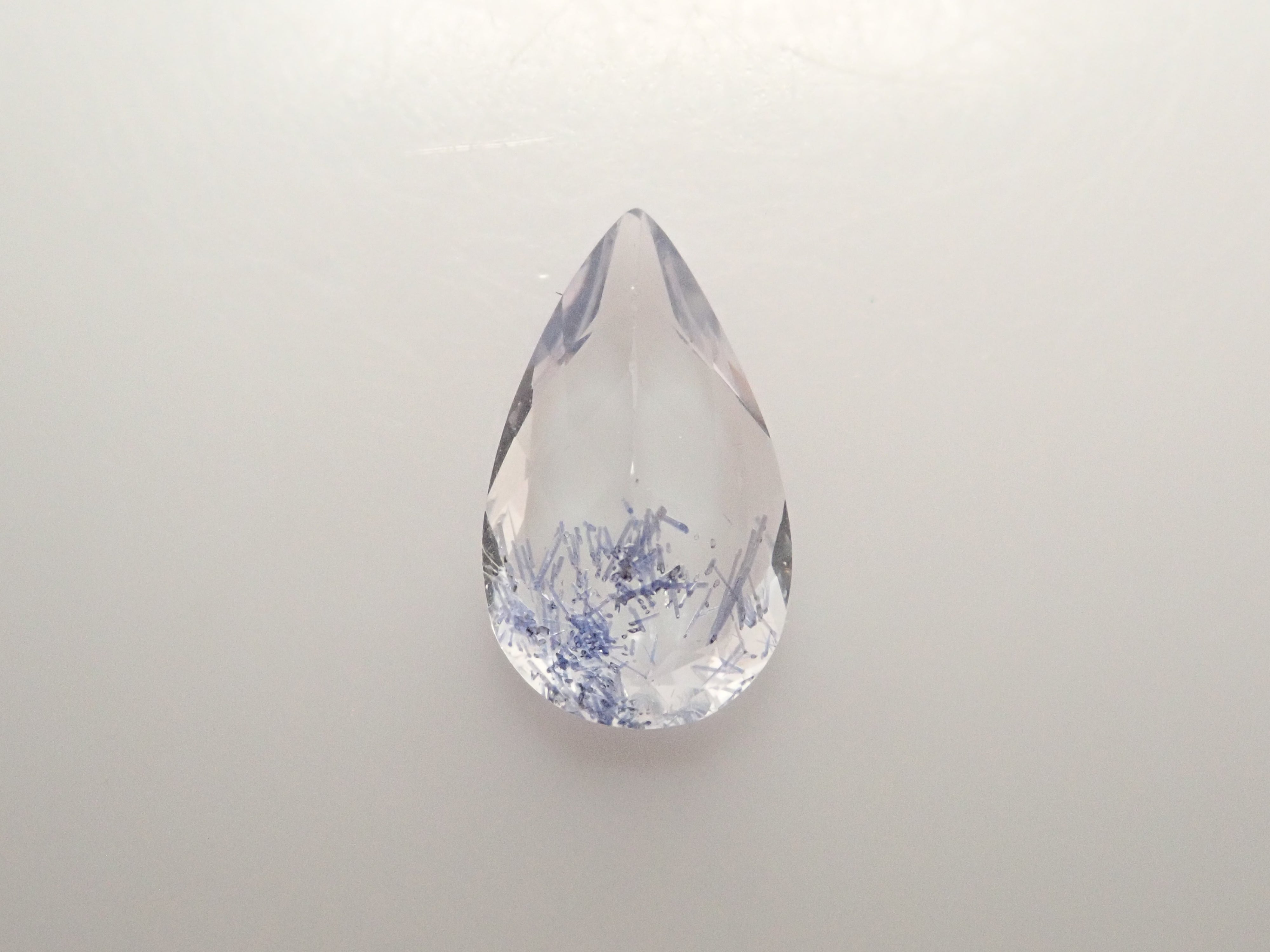 12561968掲載】ブラジル産デュモルチェライトインクォーツ 0.803ctルース