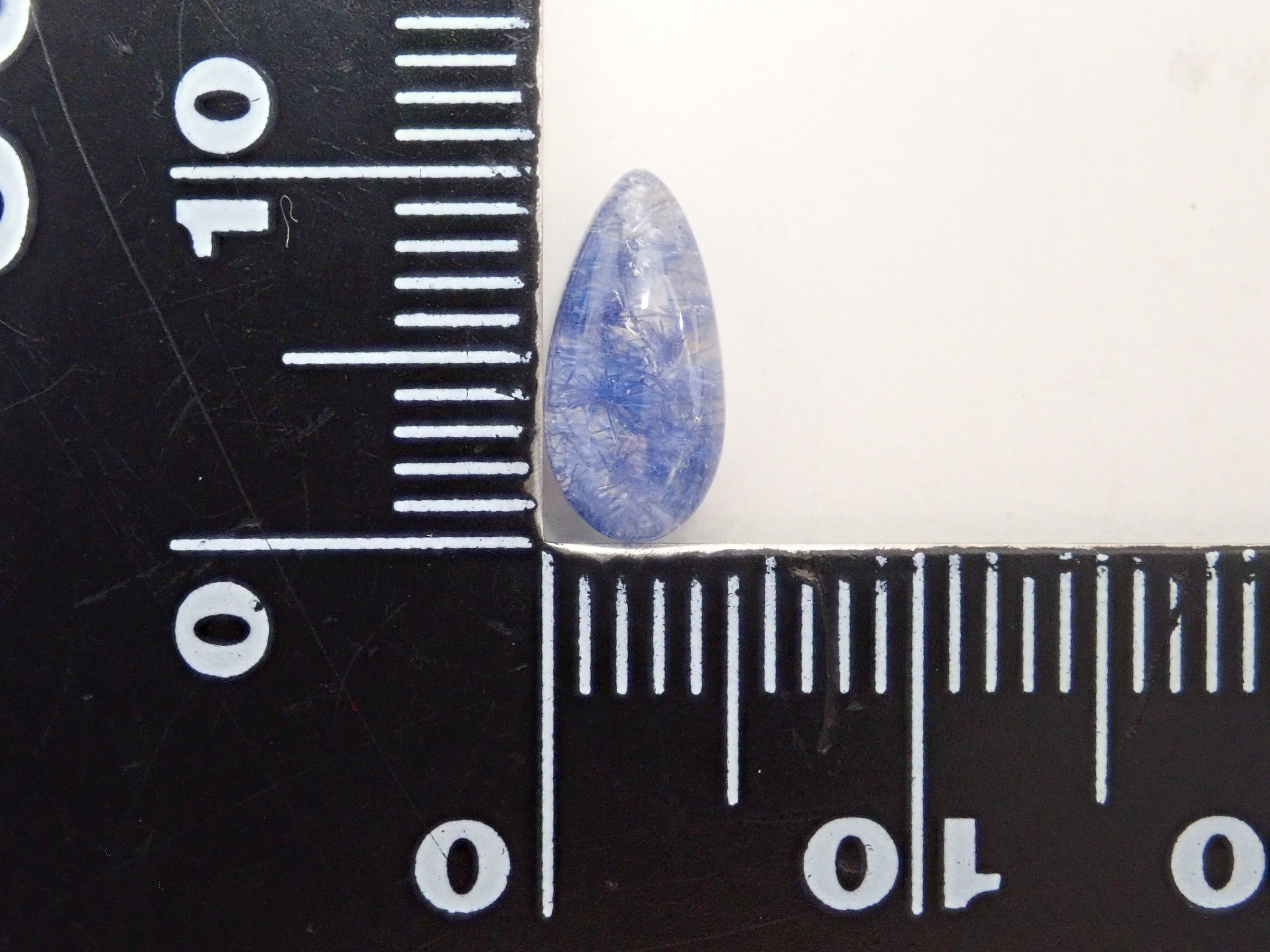 12561979掲載】ブラジル産デュモルチェライトインクォーツ 1.220ctルース