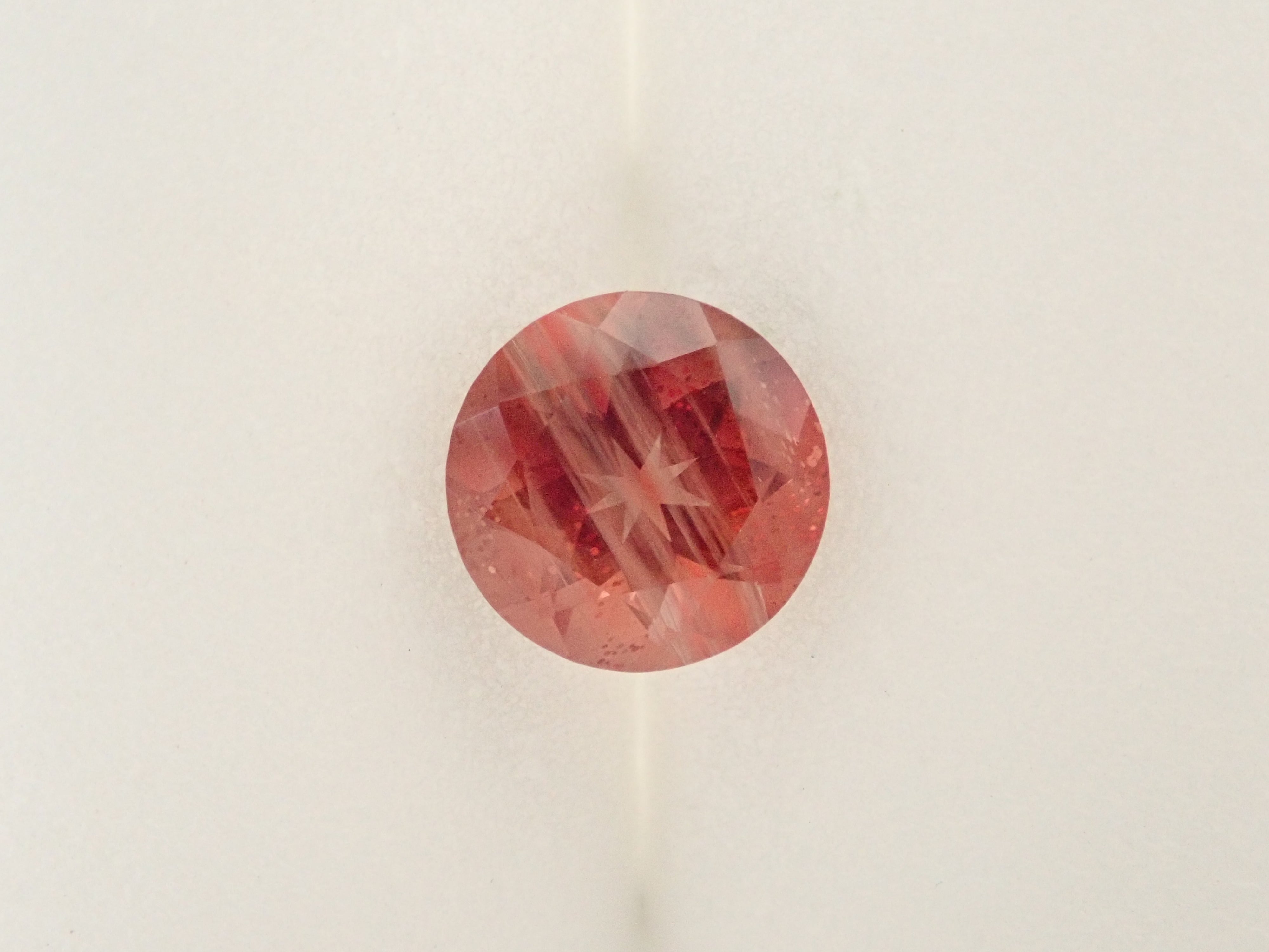 【12561984掲載】アメリカ産オレゴンサンストーン 1.308ctルース