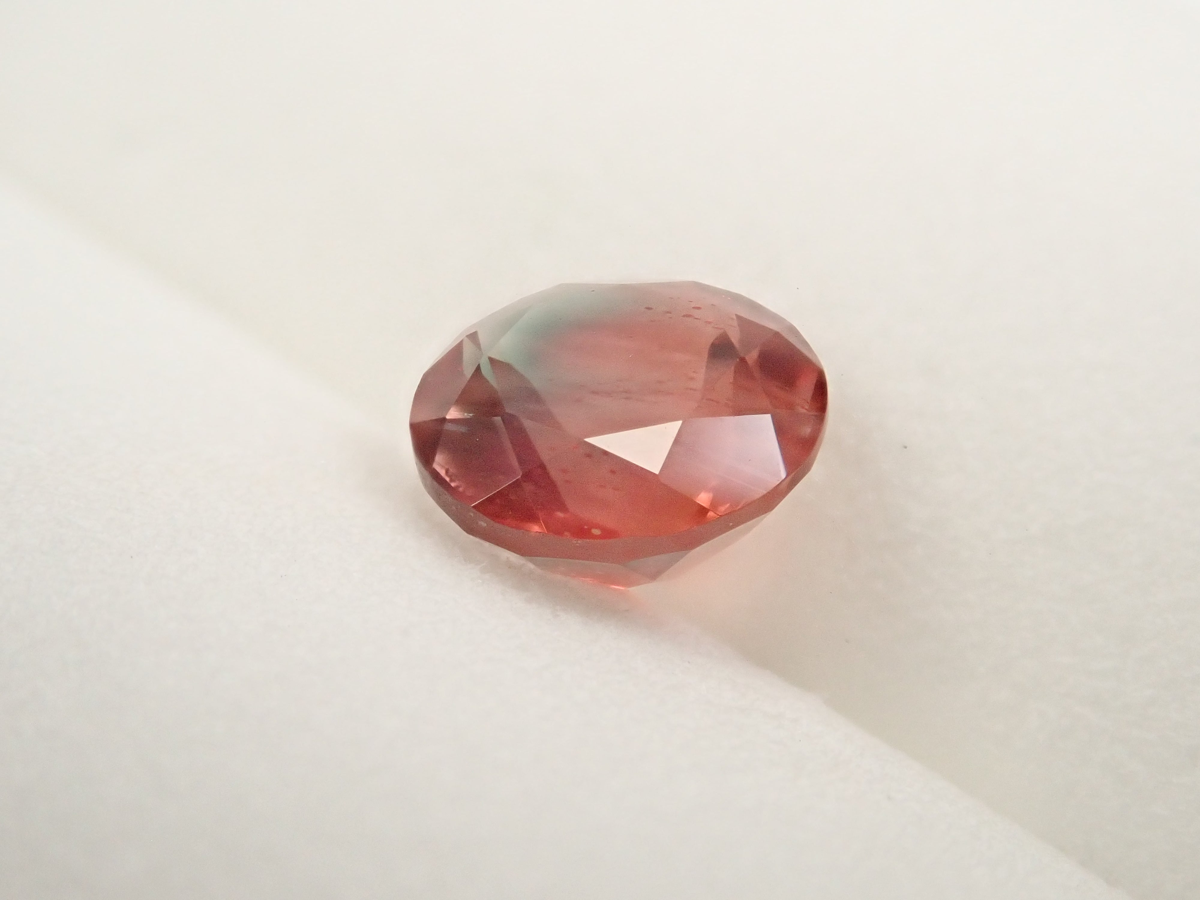 【12561984掲載】アメリカ産オレゴンサンストーン 1.308ctルース