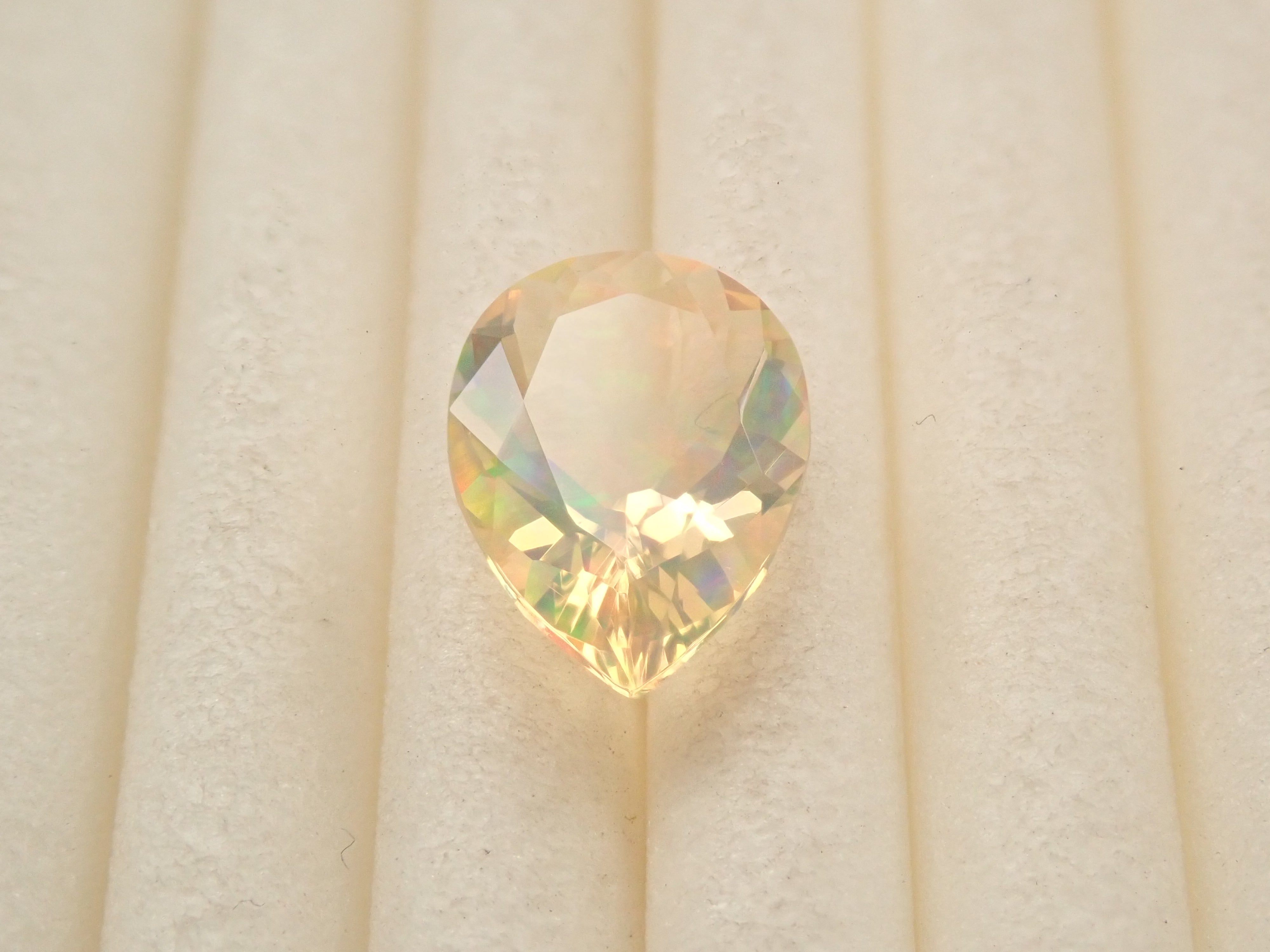 【12561173掲載】メキシコ産ファイアオパール（ファセットカット） 0.645ctルース