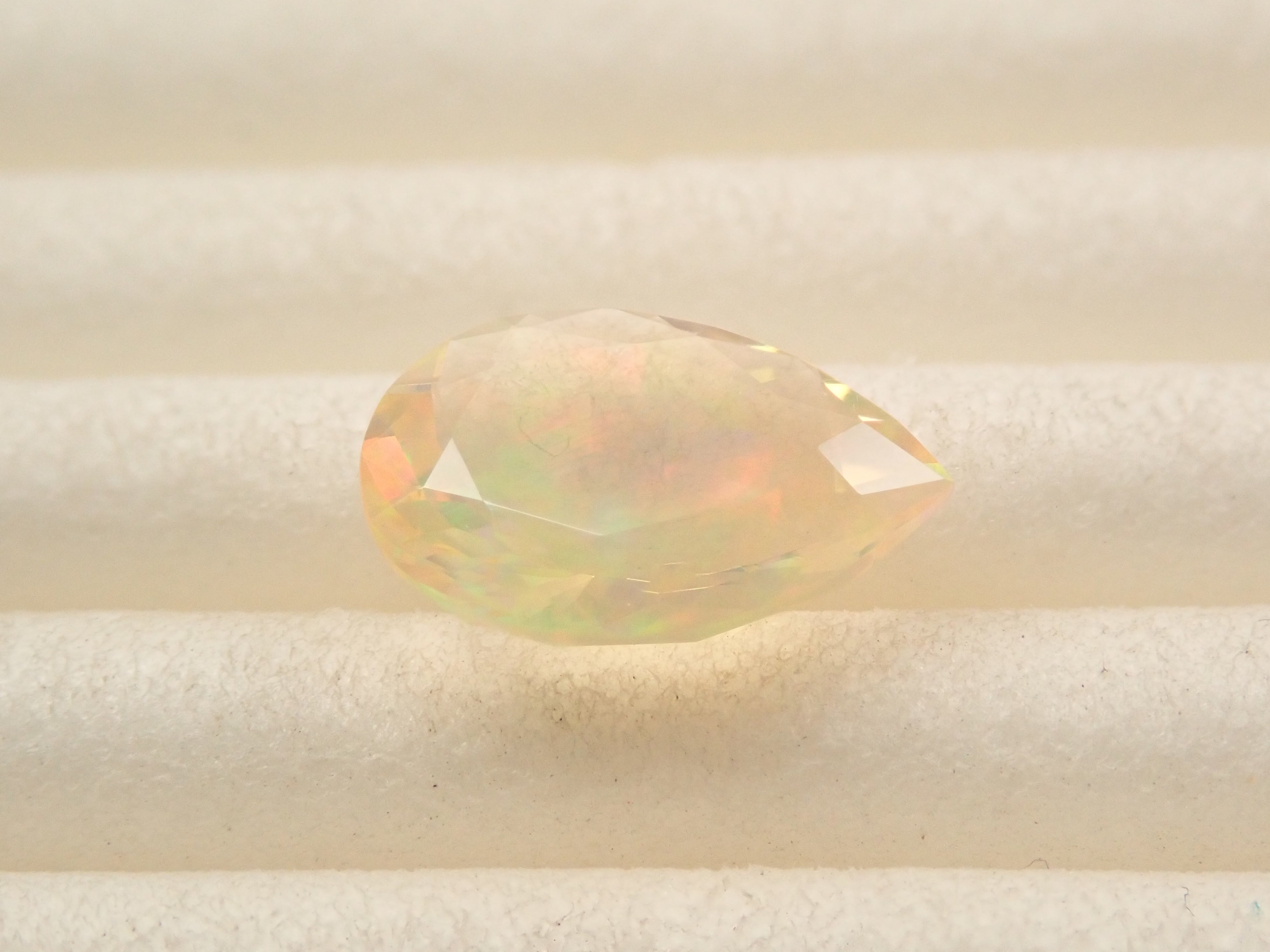 【12561173掲載】メキシコ産ファイアオパール（ファセットカット） 0.645ctルース