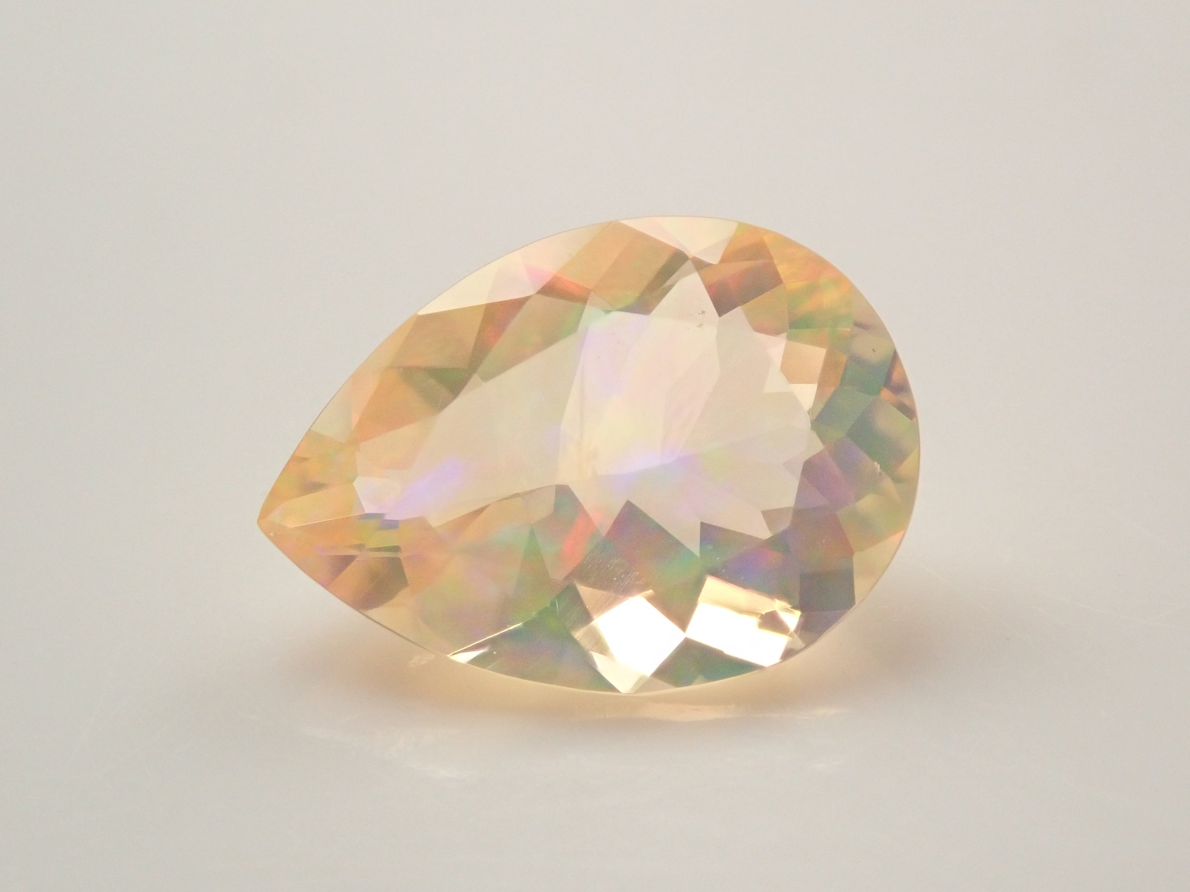 【12561173掲載】メキシコ産ファイアオパール（ファセットカット） 0.645ctルース