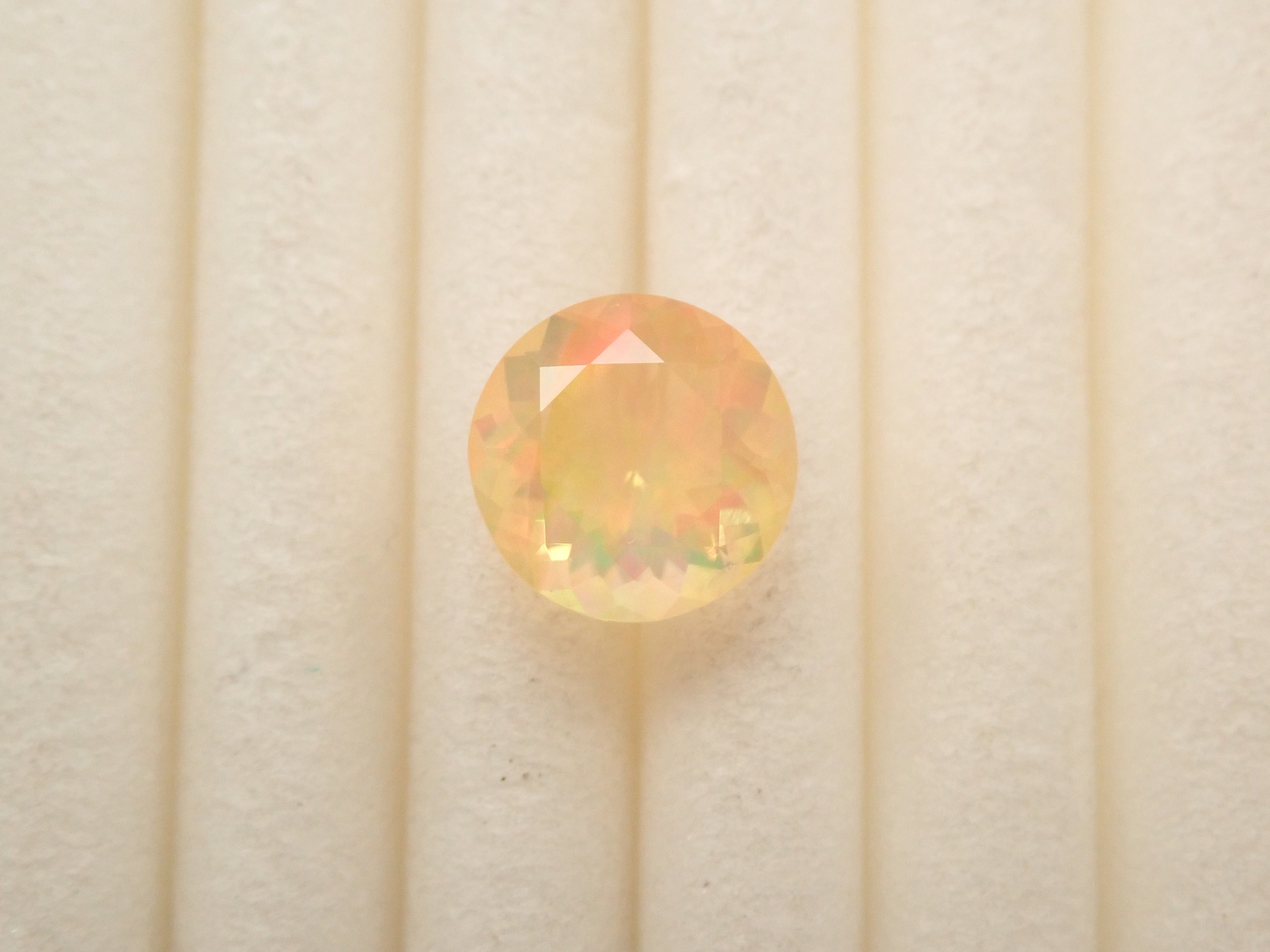 【12561174掲載】メキシコ産ファイアオパール（ファセットカット） 0.517ctルース