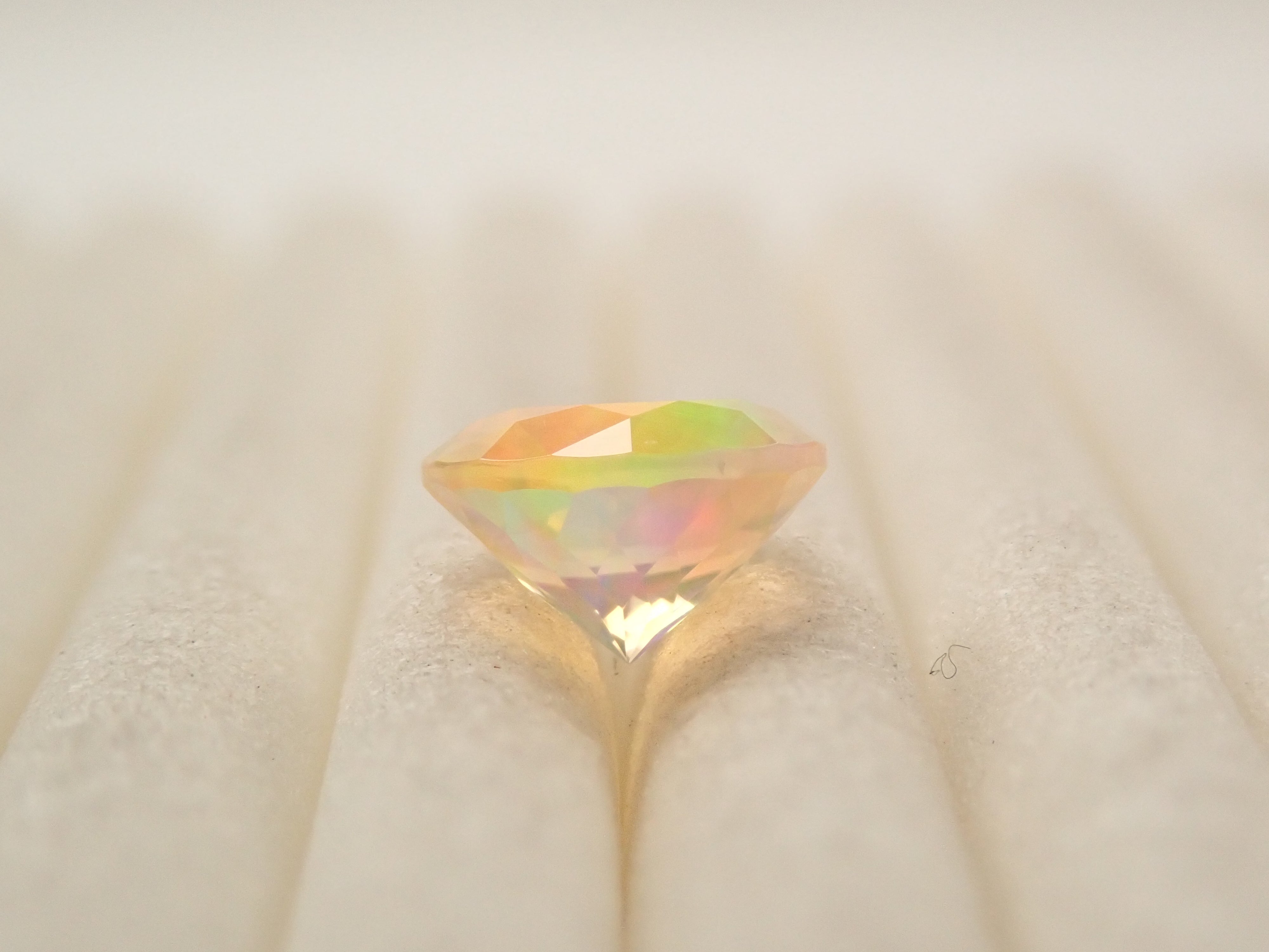 【12561174掲載】メキシコ産ファイアオパール（ファセットカット） 0.517ctルース