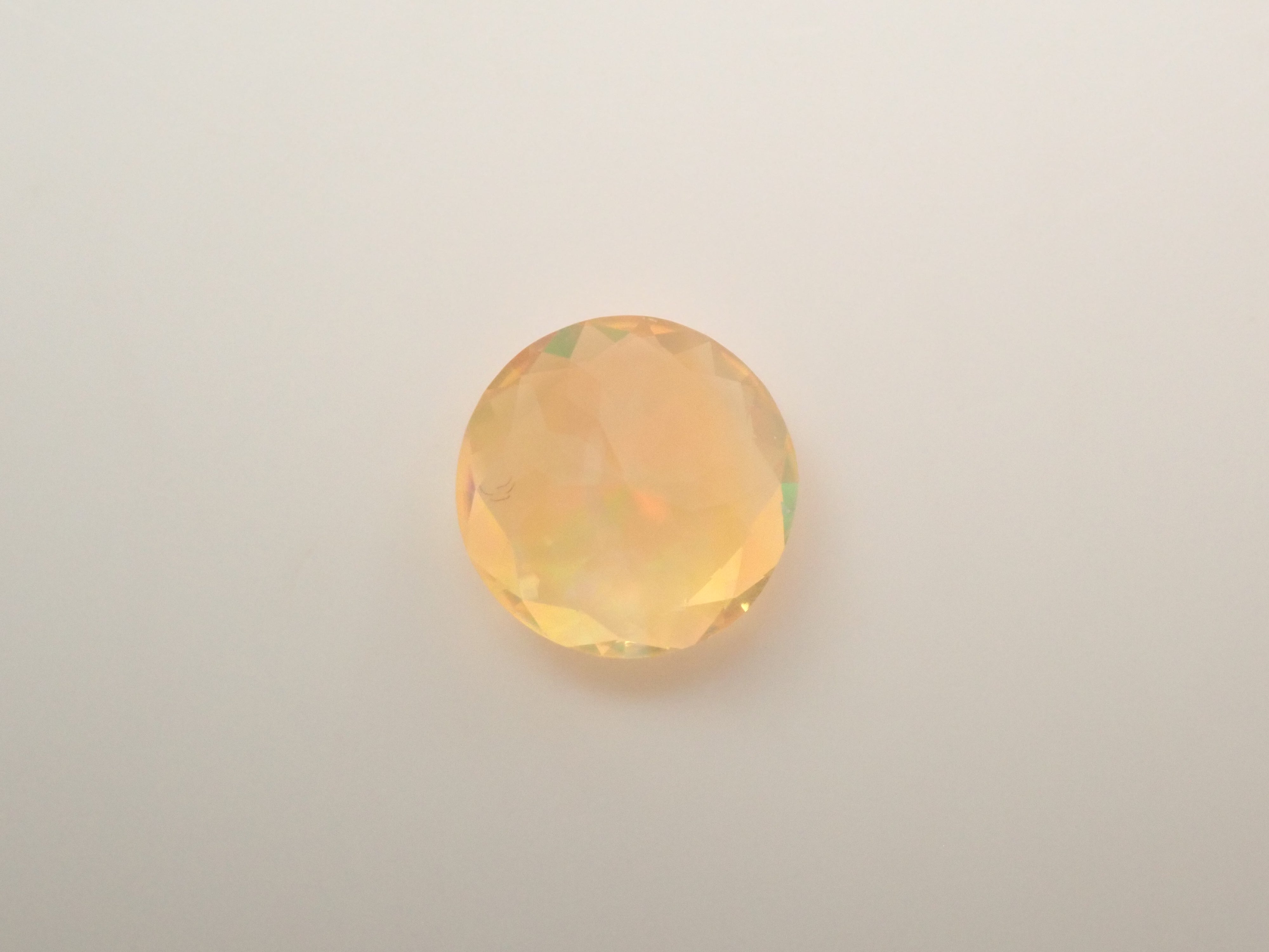 【12561174掲載】メキシコ産ファイアオパール（ファセットカット） 0.517ctルース