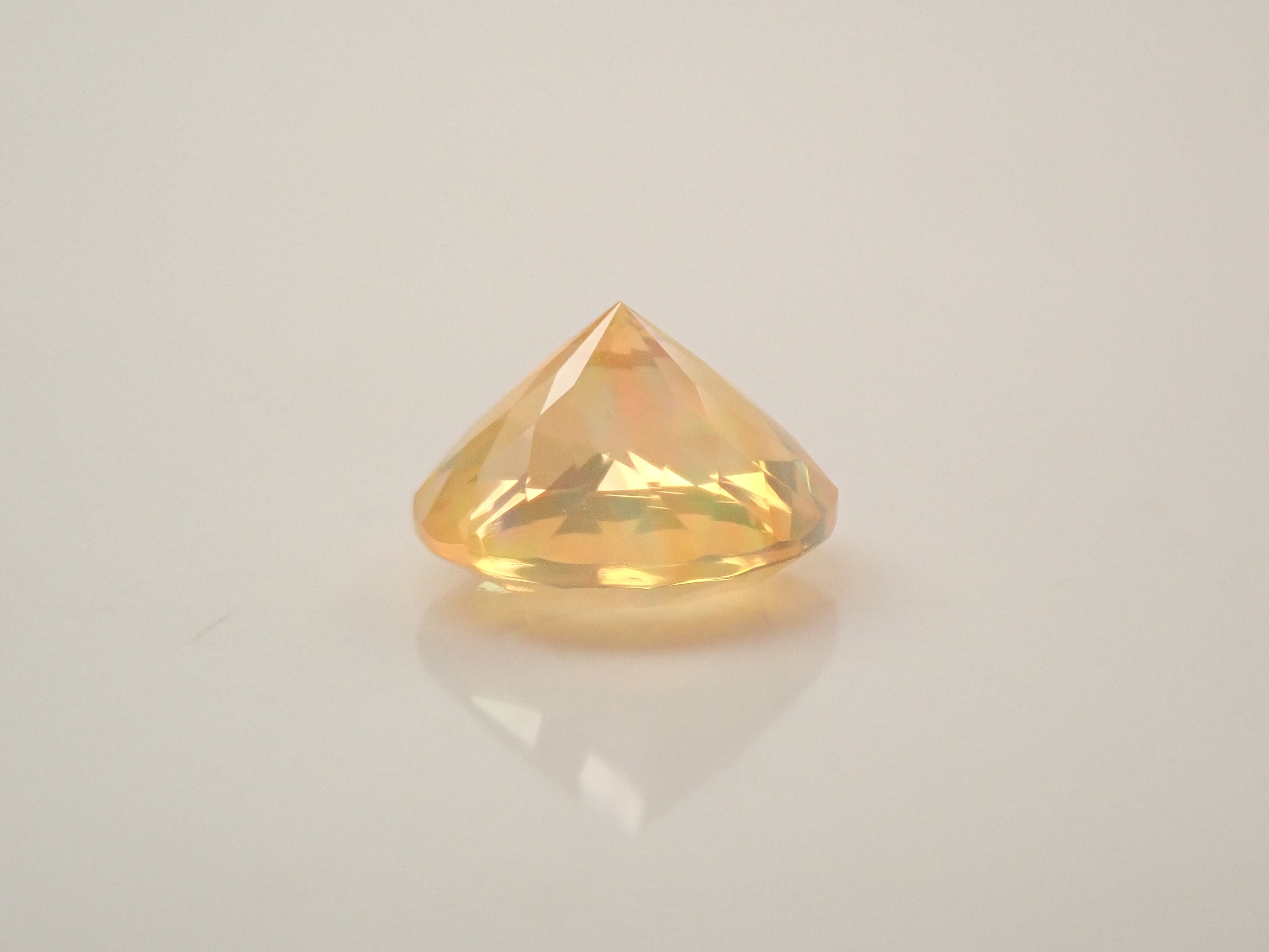 【12561174掲載】メキシコ産ファイアオパール（ファセットカット） 0.517ctルース