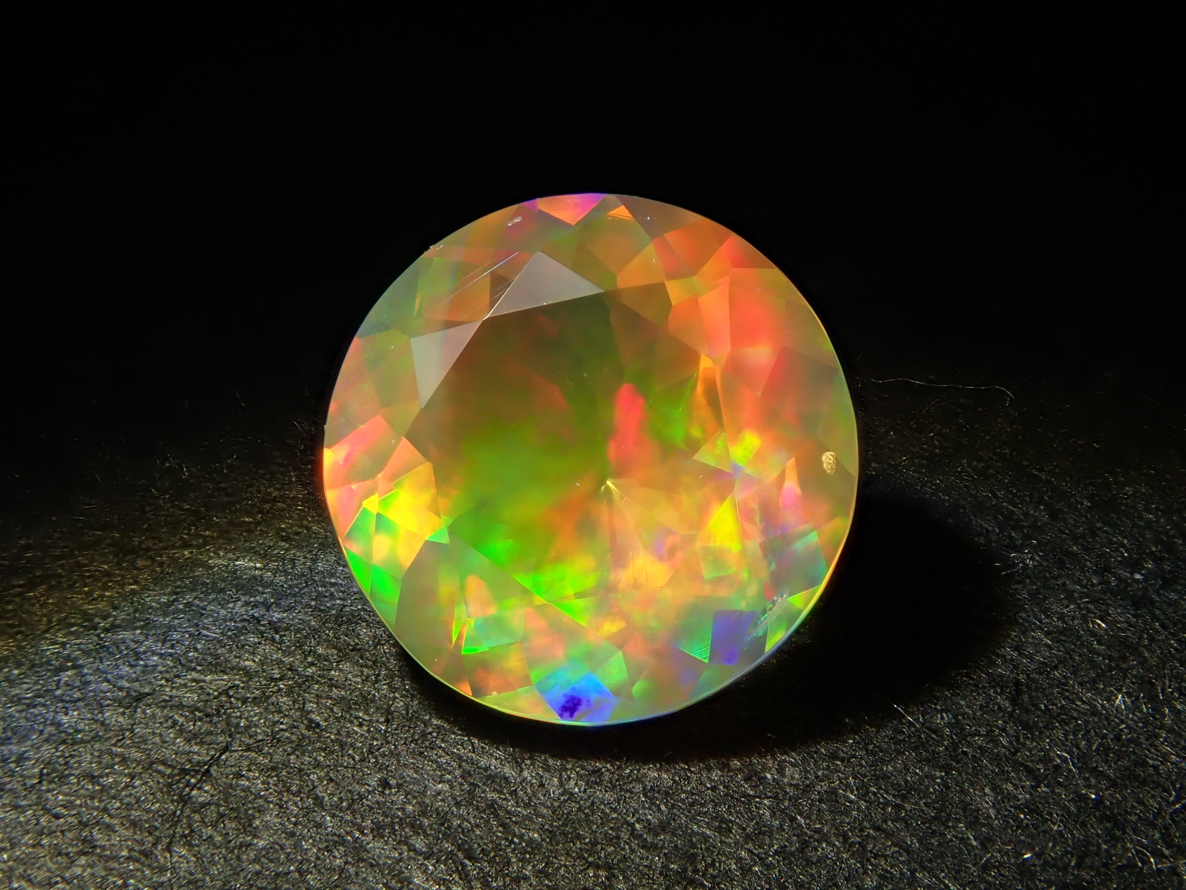 【12561174掲載】メキシコ産ファイアオパール（ファセットカット） 0.517ctルース