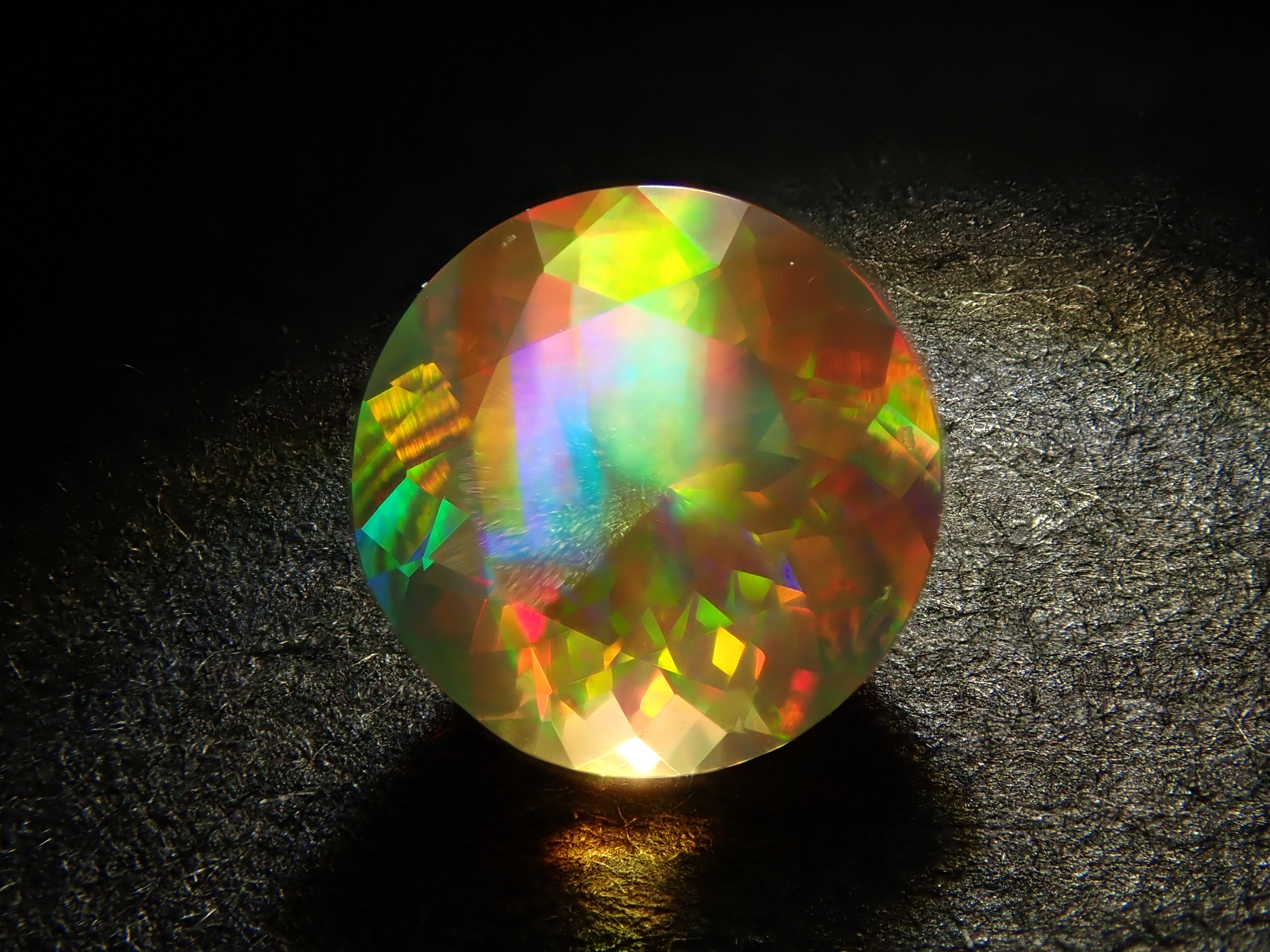 【12561174掲載】メキシコ産ファイアオパール（ファセットカット） 0.517ctルース