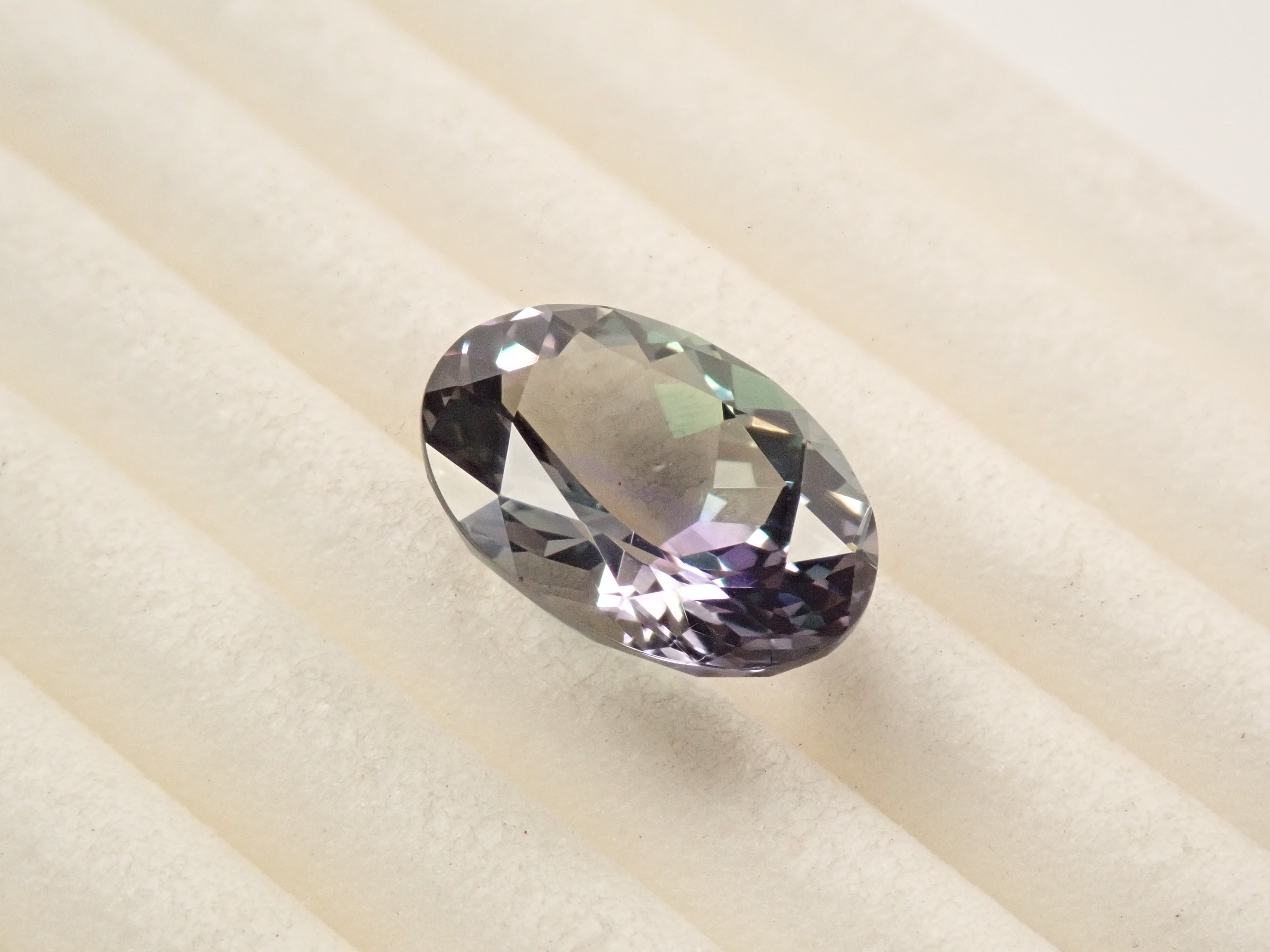 【12561550掲載】タンザニア産バイカラーゾイサイト 2.322ctルース