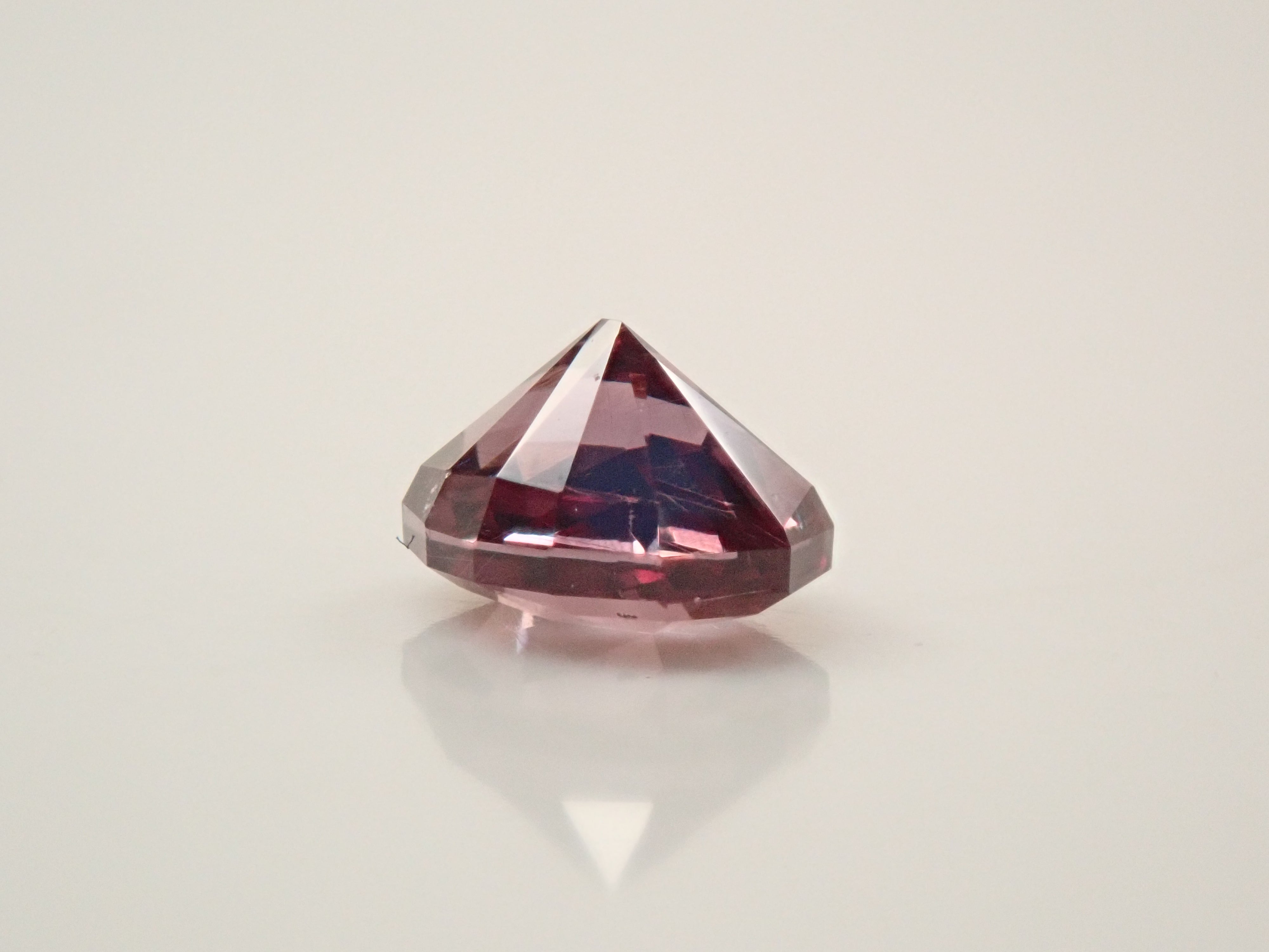 【12561632掲載】タンザニア産カラーチェンジガーネット 0.607ctルース