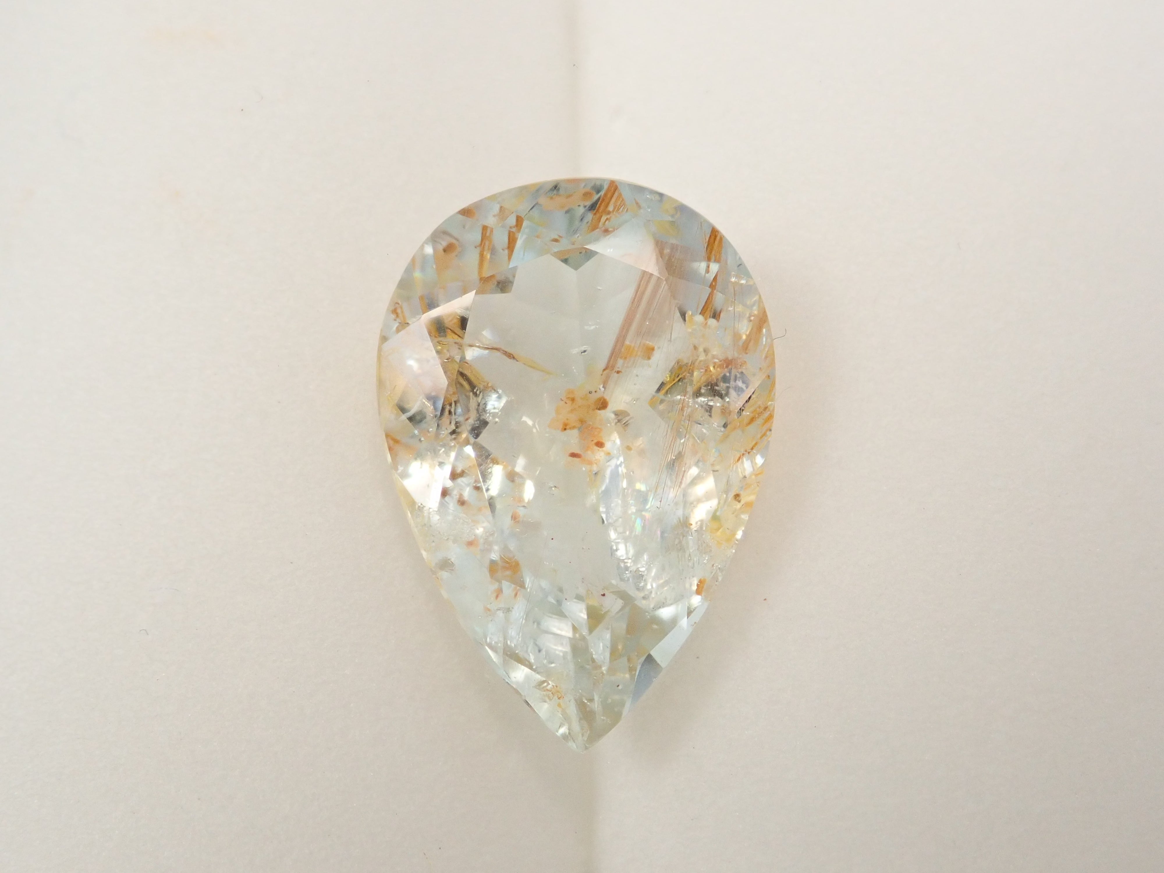 【12562024掲載】ブラジル産ライモナイトインブルートパーズ 9.314ctルース