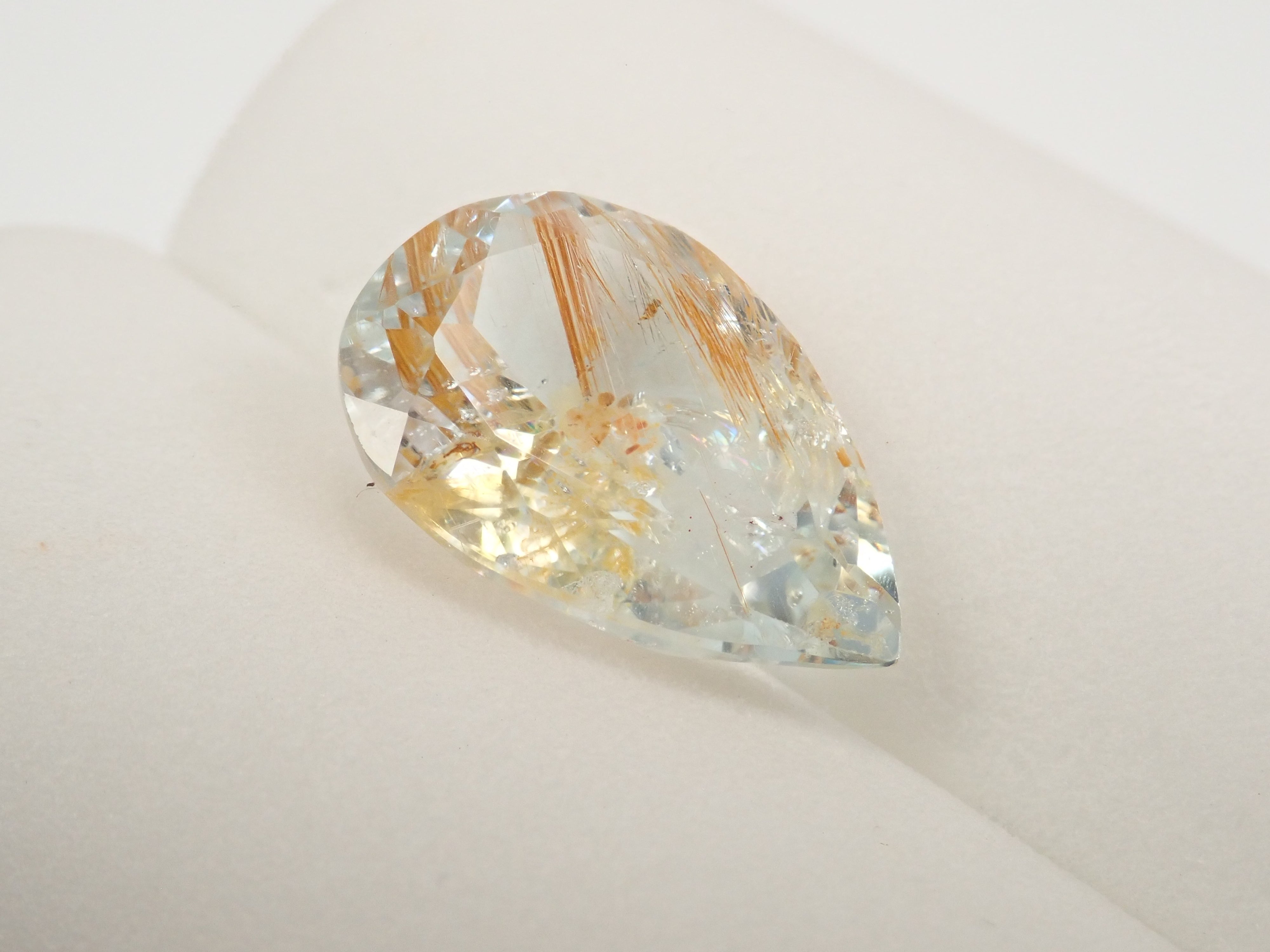 【12562024掲載】ブラジル産ライモナイトインブルートパーズ 9.314ctルース