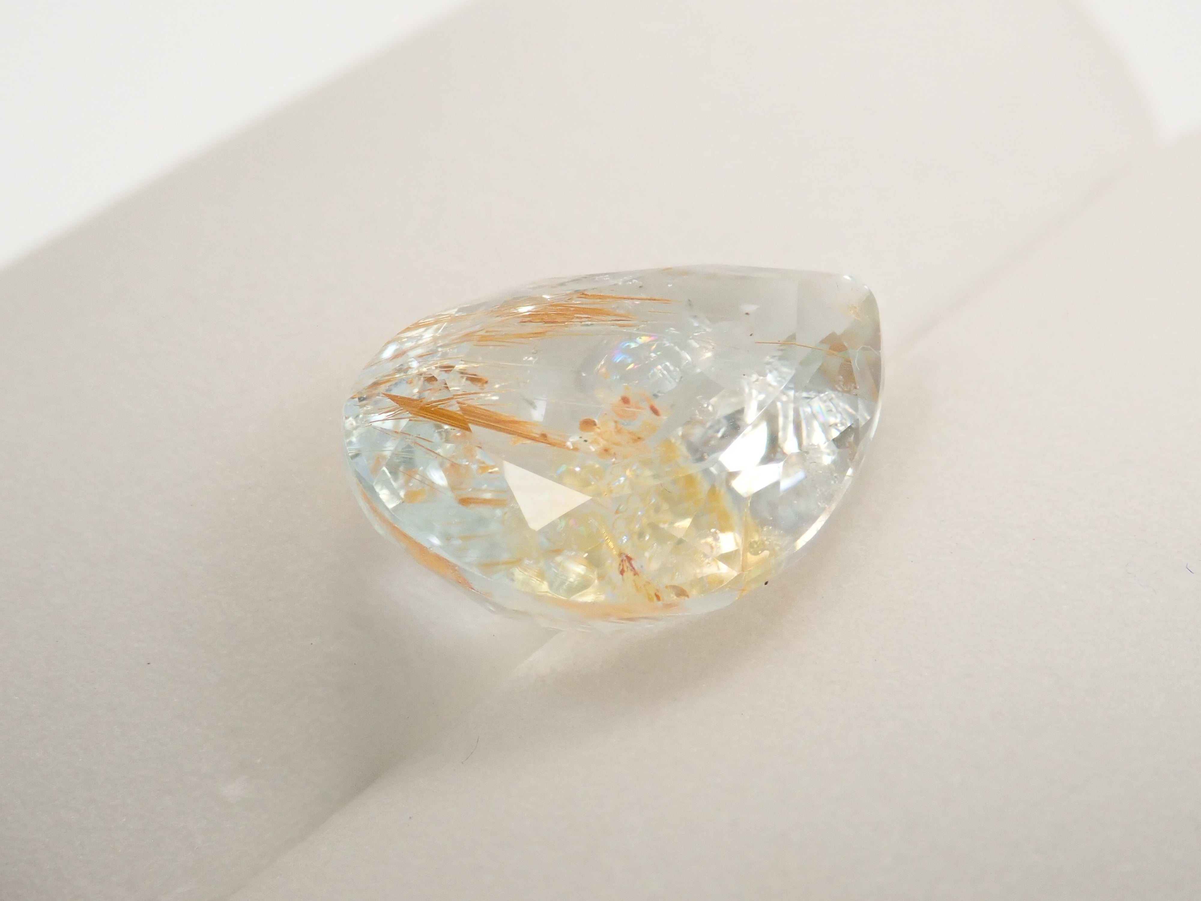 【12562024掲載】ブラジル産ライモナイトインブルートパーズ 9.314ctルース