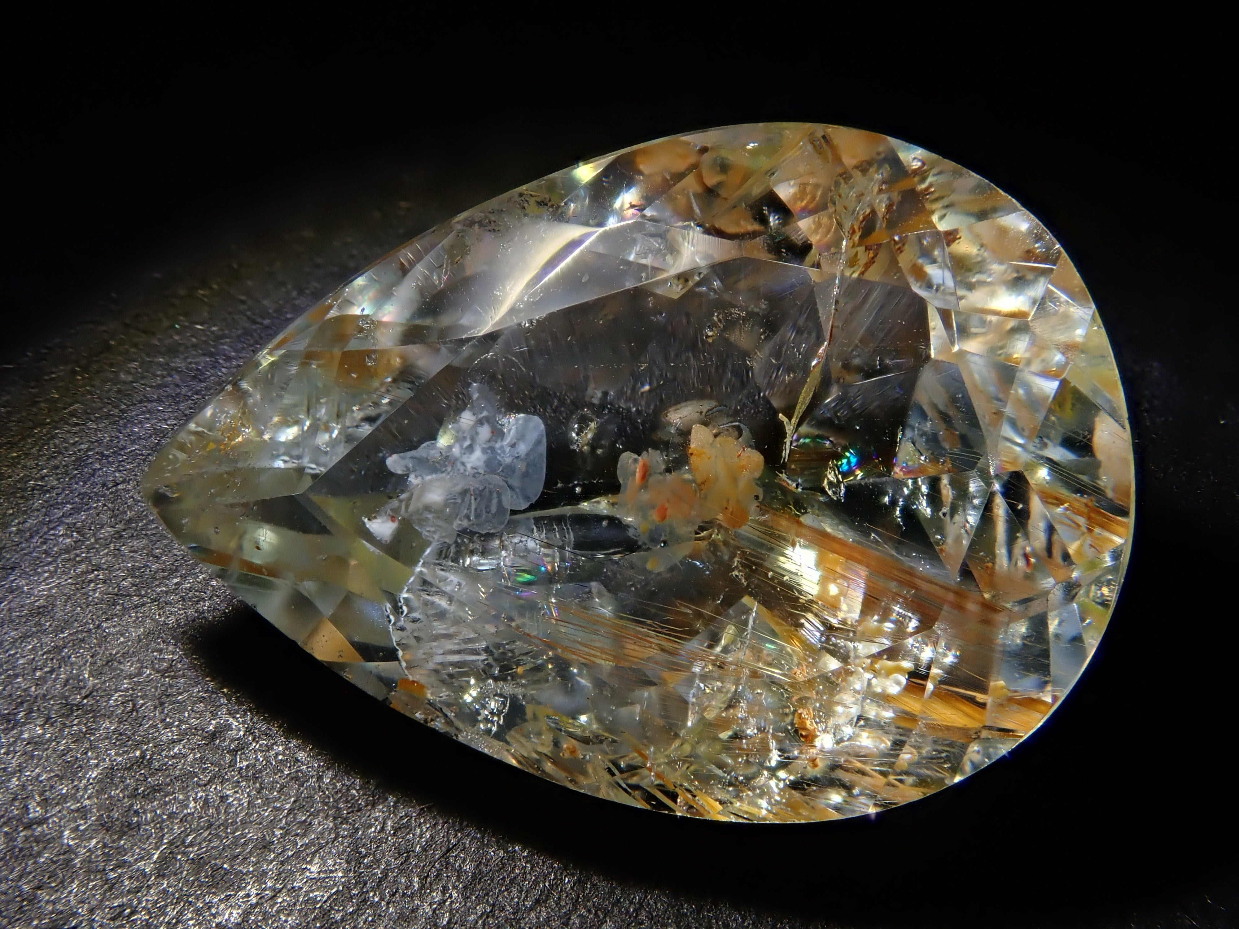 【12562024掲載】ブラジル産ライモナイトインブルートパーズ 9.314ctルース