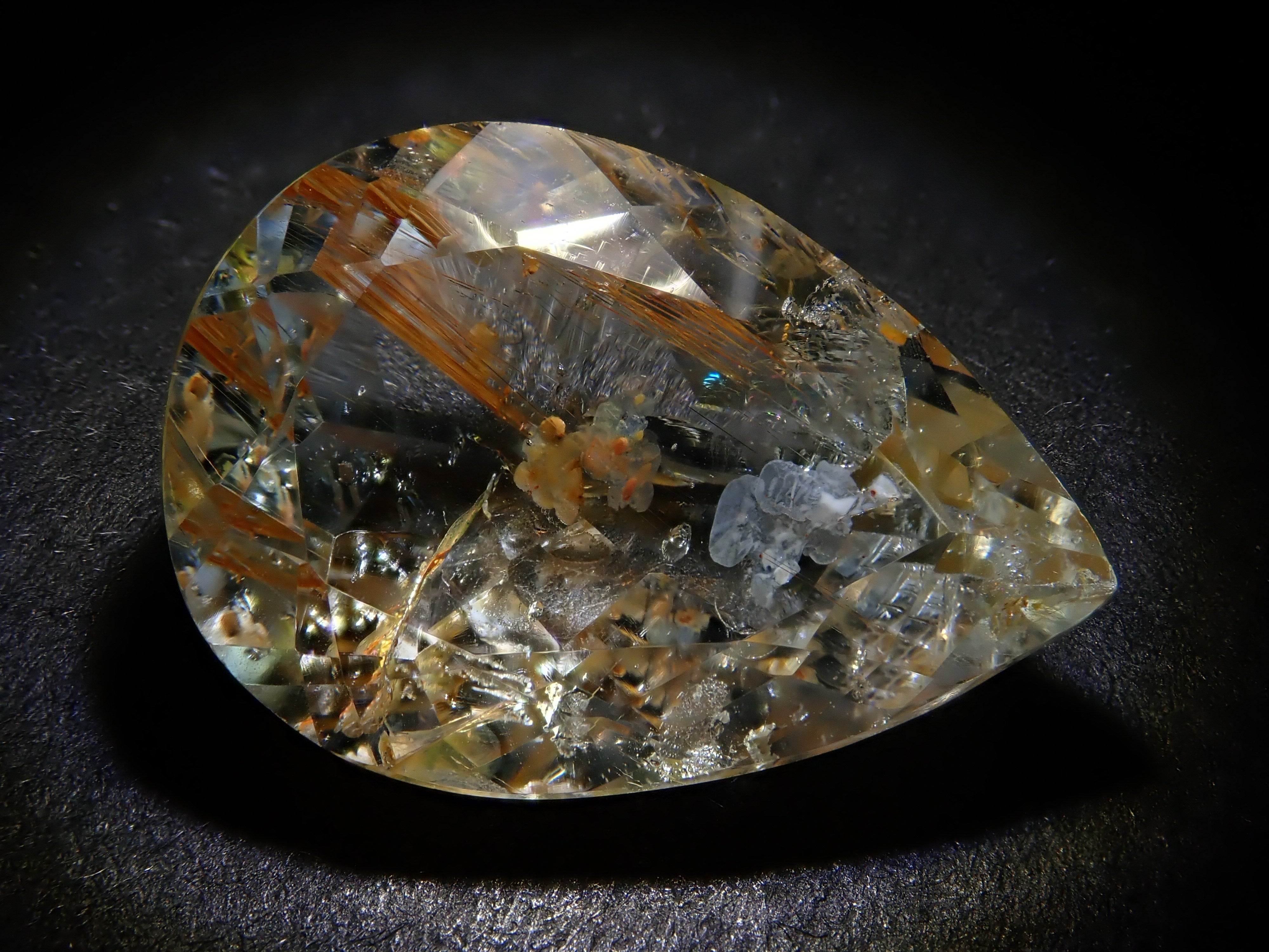 【12562024掲載】ブラジル産ライモナイトインブルートパーズ 9.314ctルース