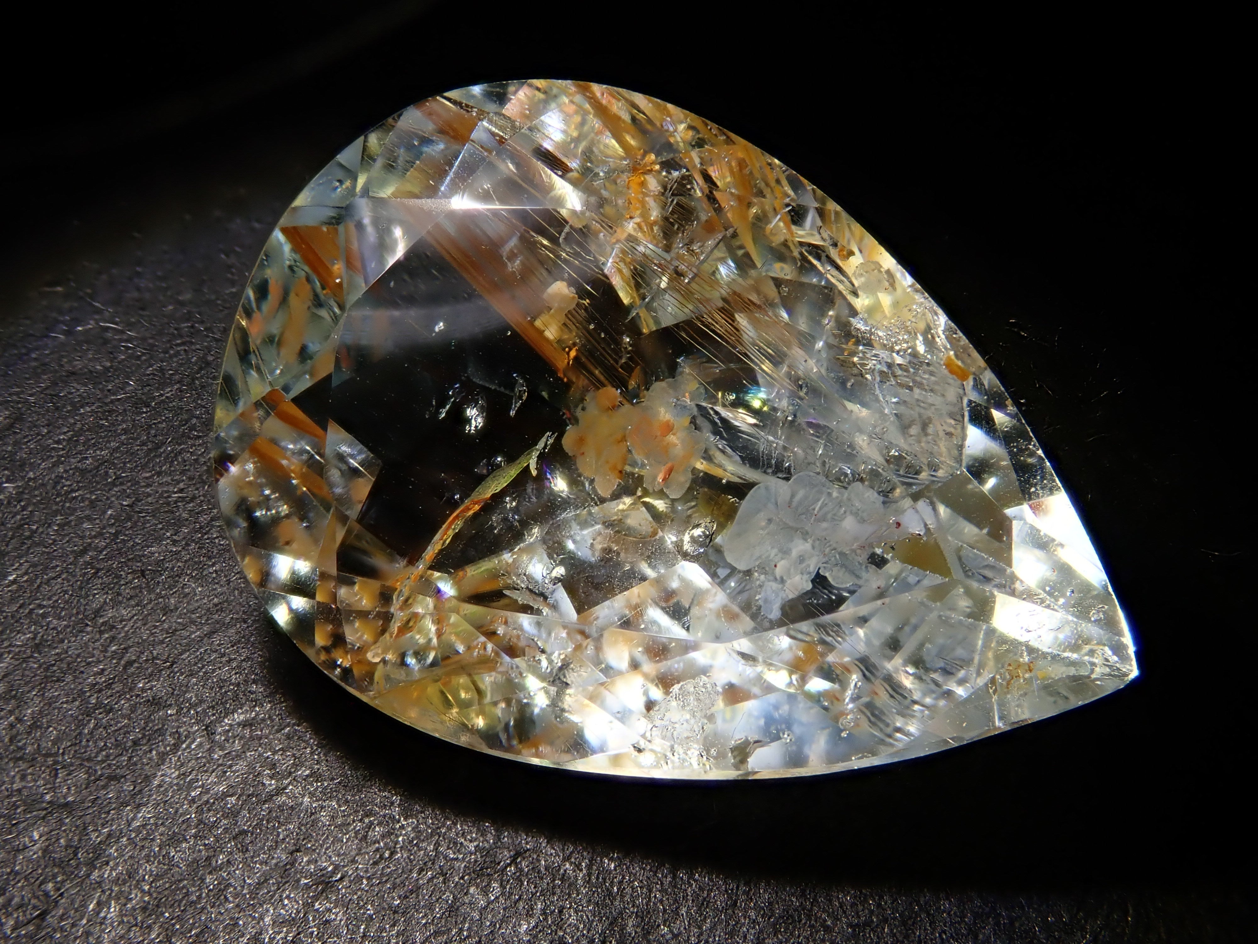 【12562024掲載】ブラジル産ライモナイトインブルートパーズ 9.314ctルース