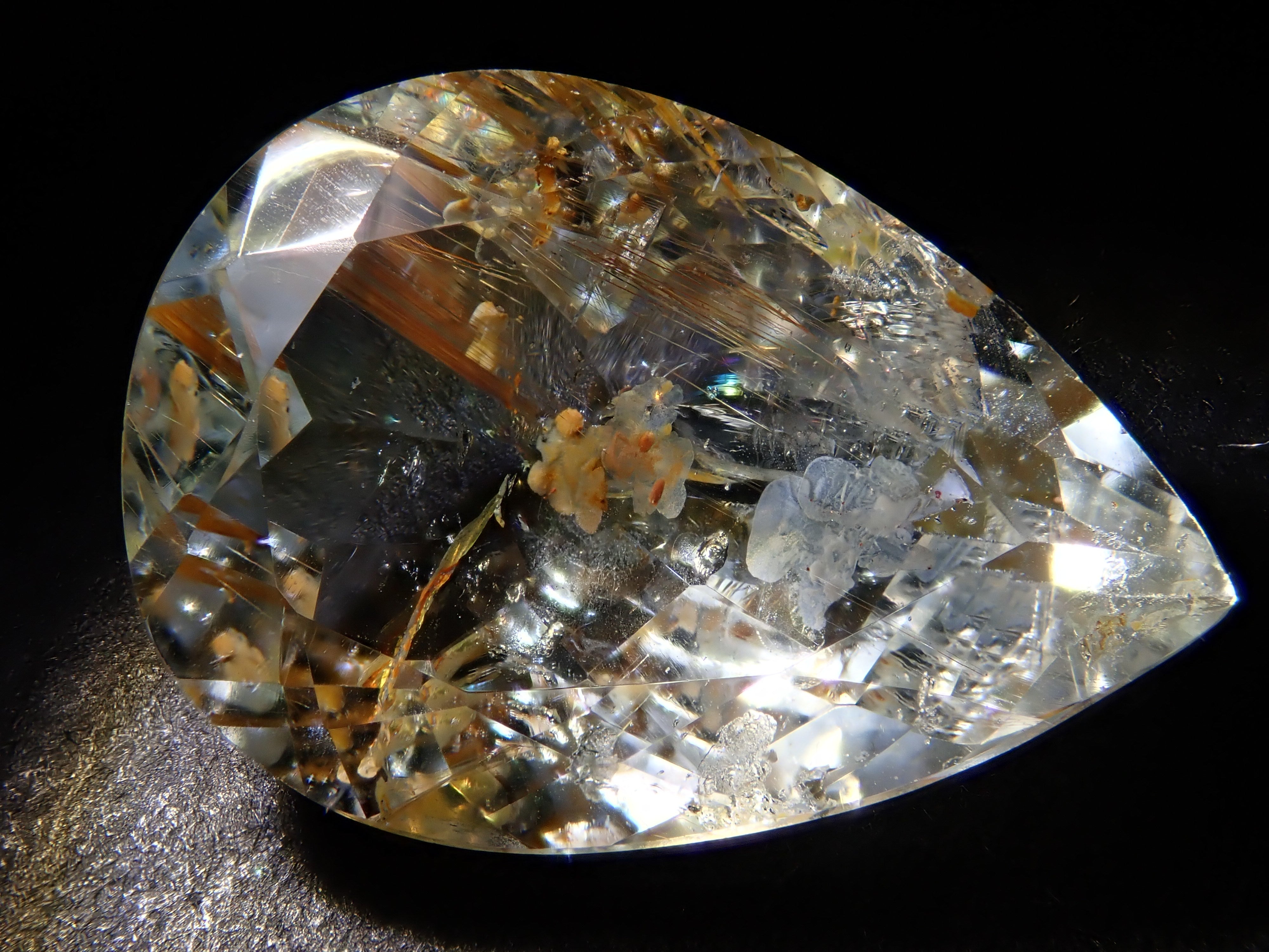 【12562024掲載】ブラジル産ライモナイトインブルートパーズ 9.314ctルース