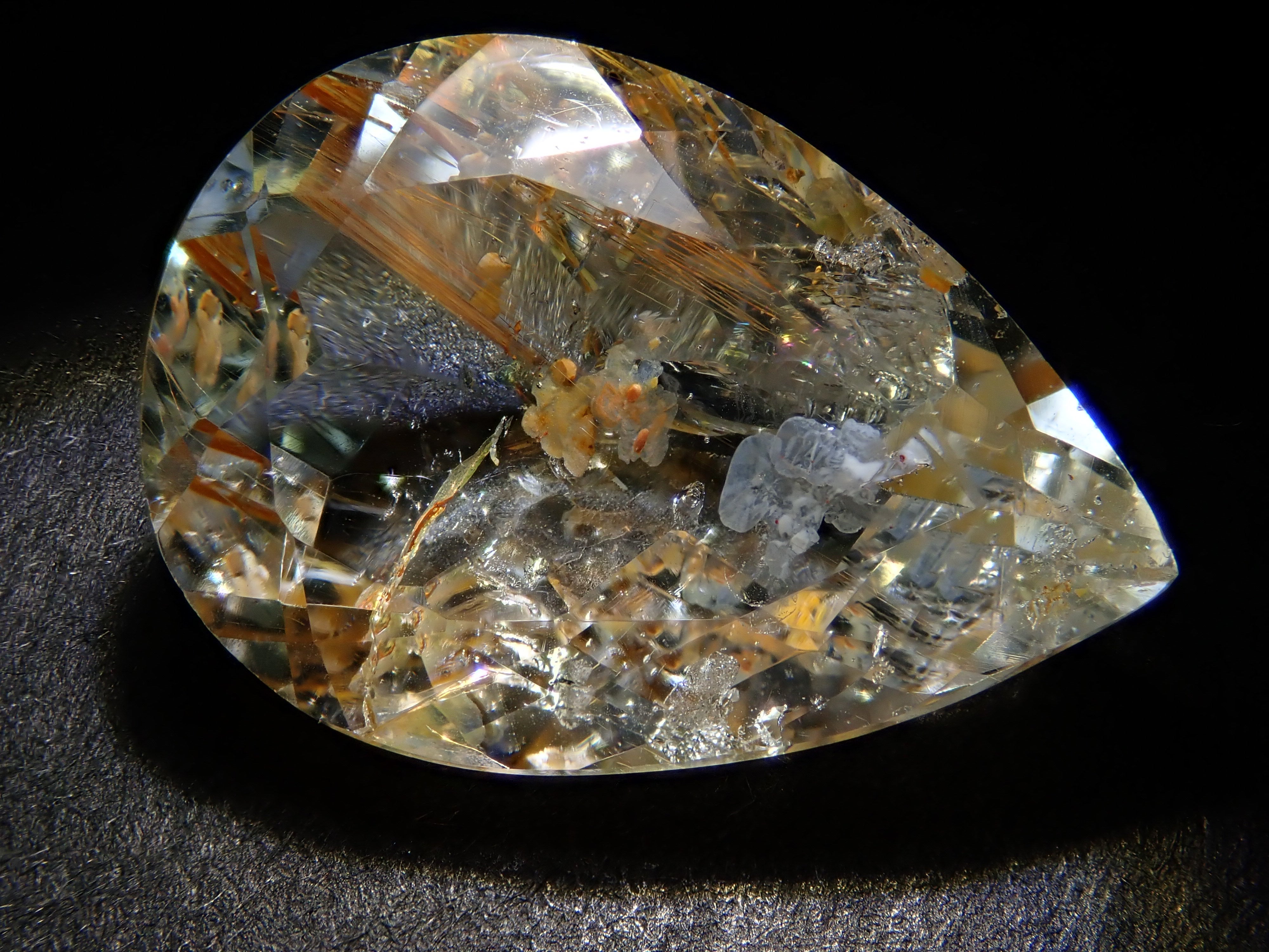 【12562024掲載】ブラジル産ライモナイトインブルートパーズ 9.314ctルース