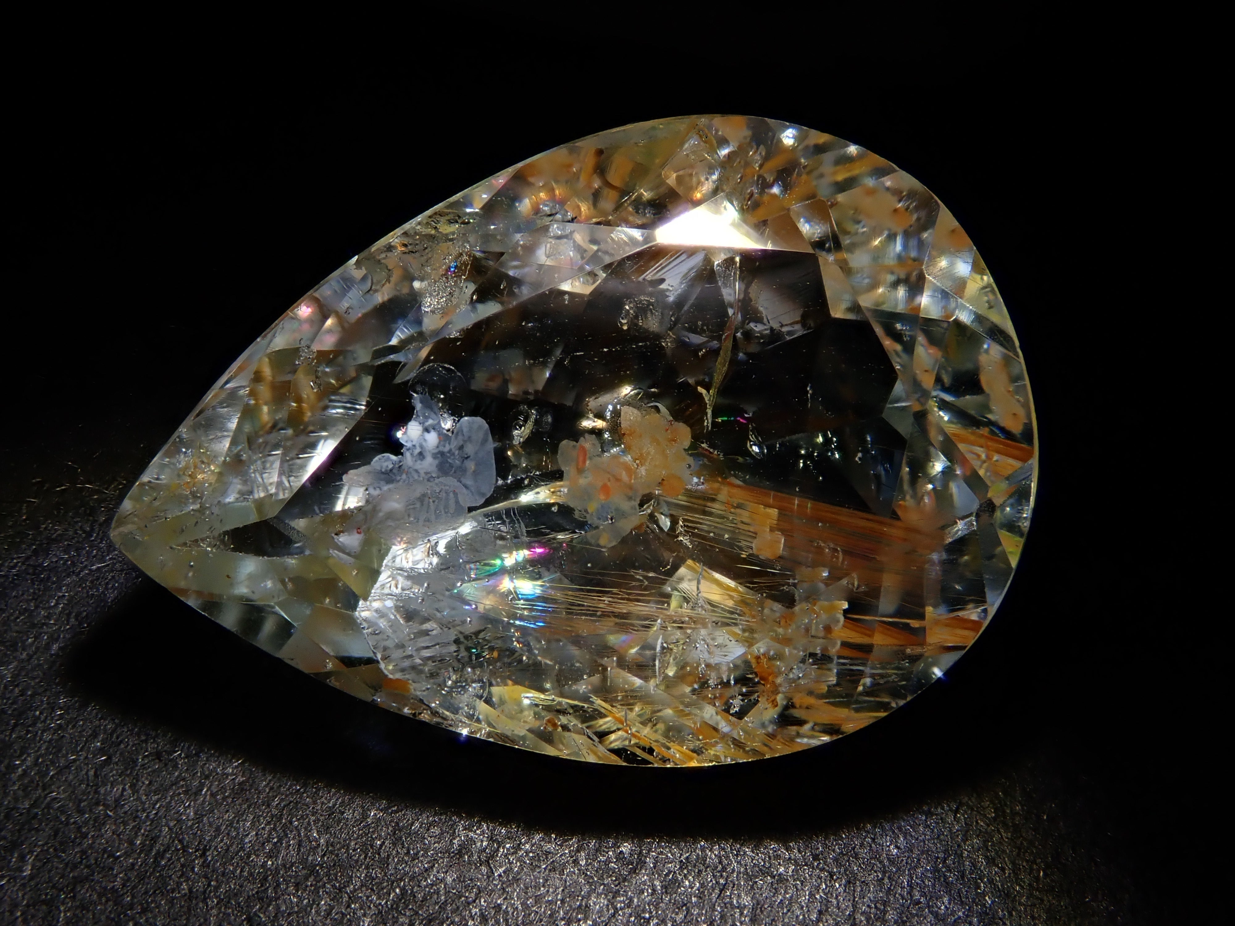 【12562024掲載】ブラジル産ライモナイトインブルートパーズ 9.314ctルース