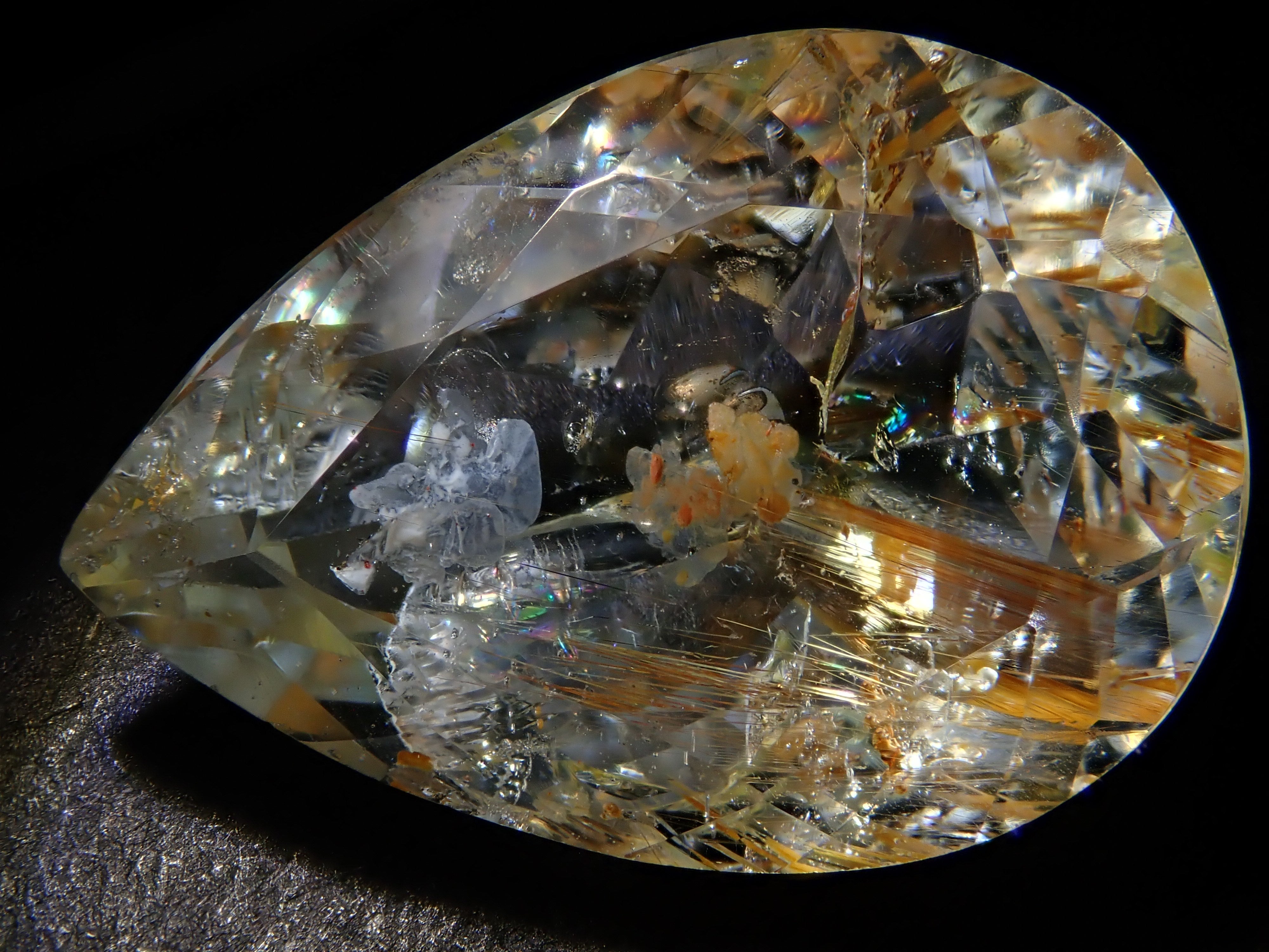 【12562024掲載】ブラジル産ライモナイトインブルートパーズ 9.314ctルース