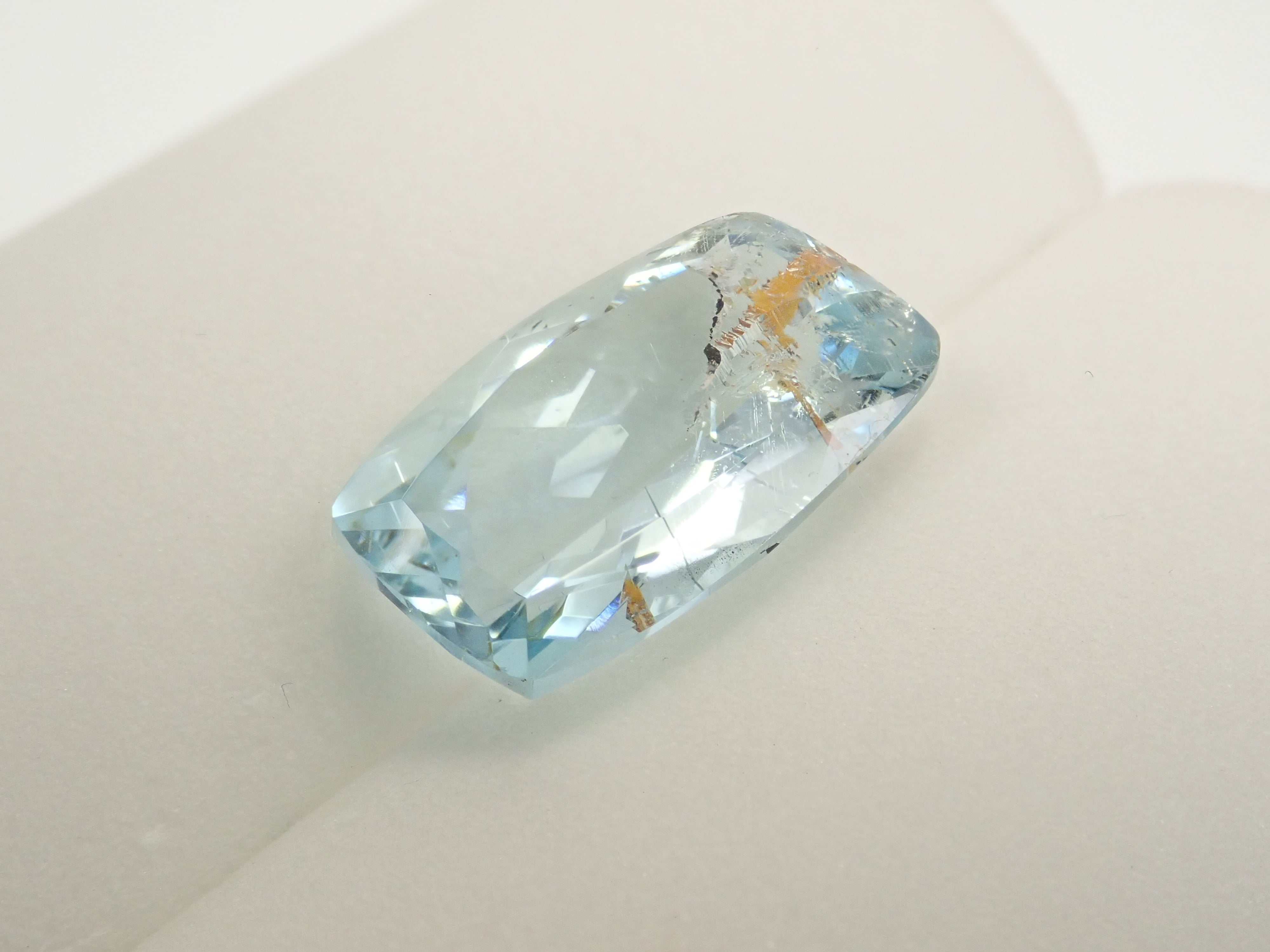 【12562025掲載】ブラジル産ライモナイトインブルートパーズ 6.701ctルース