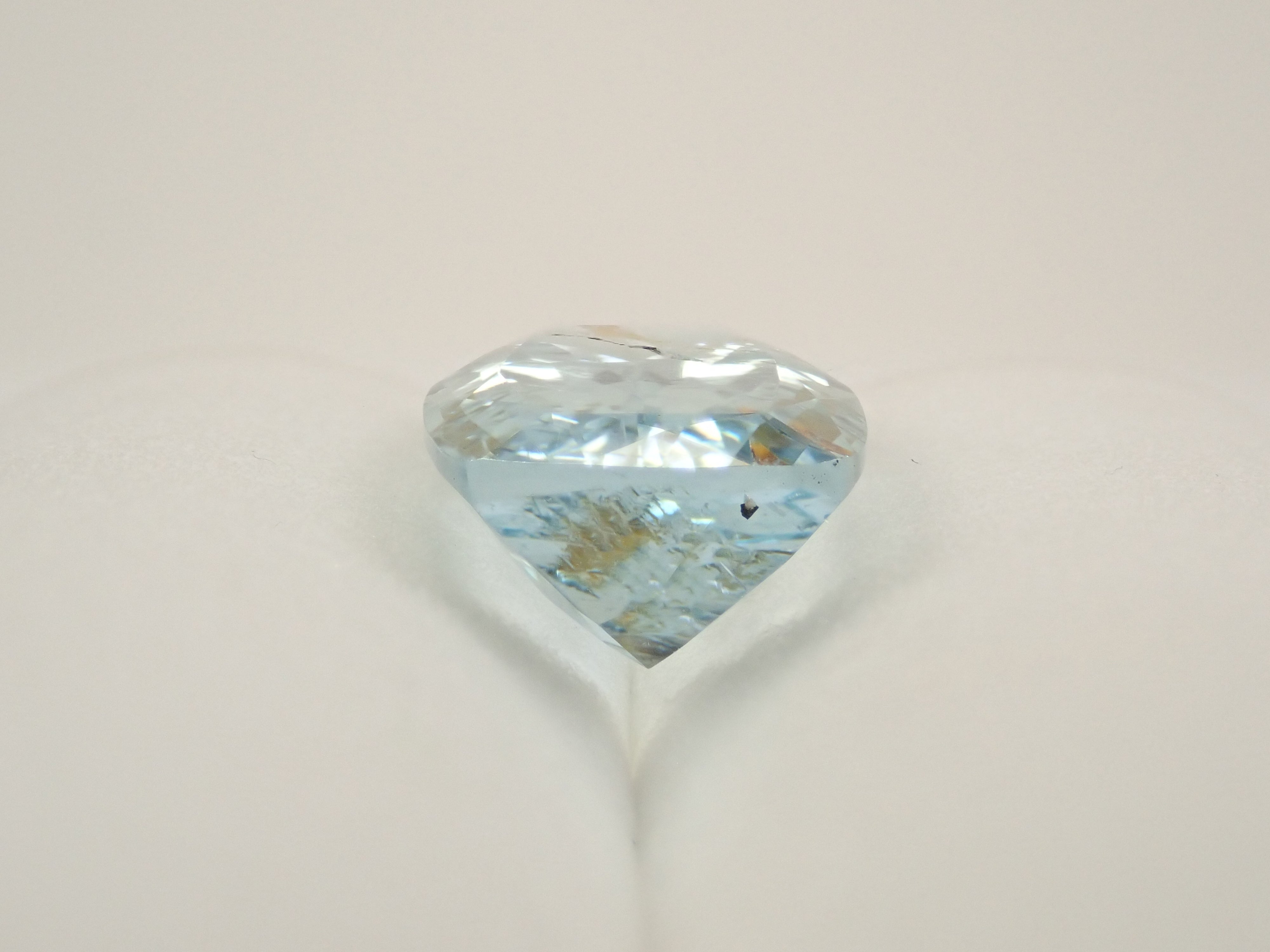 【12562025掲載】ブラジル産ライモナイトインブルートパーズ 6.701ctルース